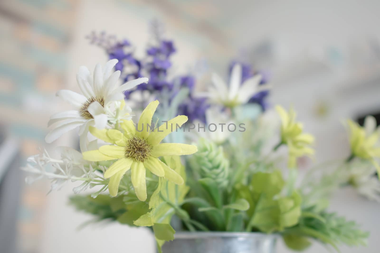 Close up white and green flowers with pollen. Blooming of fake flower and leaf. Select focus shallow depth of field and blurred background.
