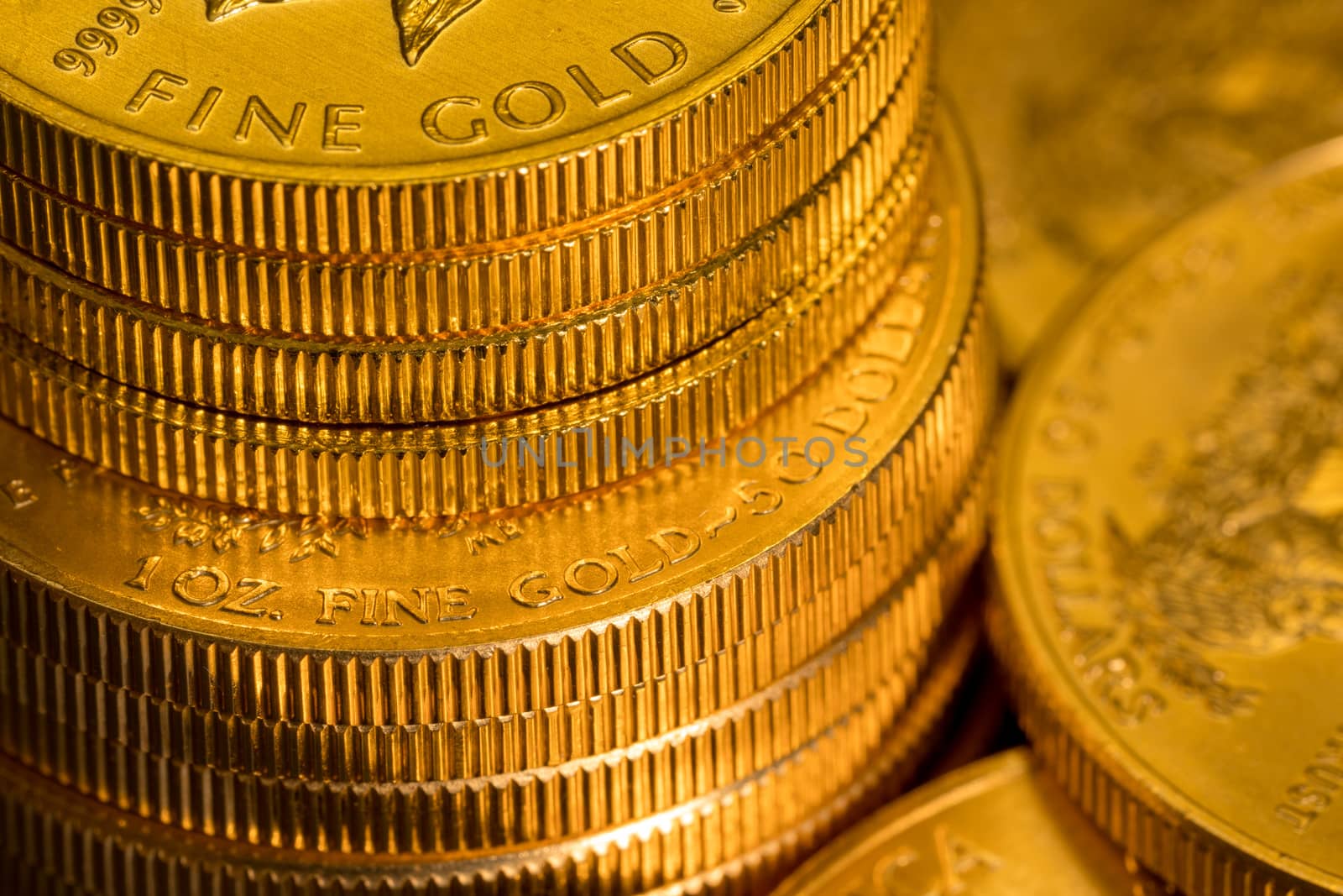Stack of golden coins using US Treasury issue Gold Eagle one ounce pure gold coin