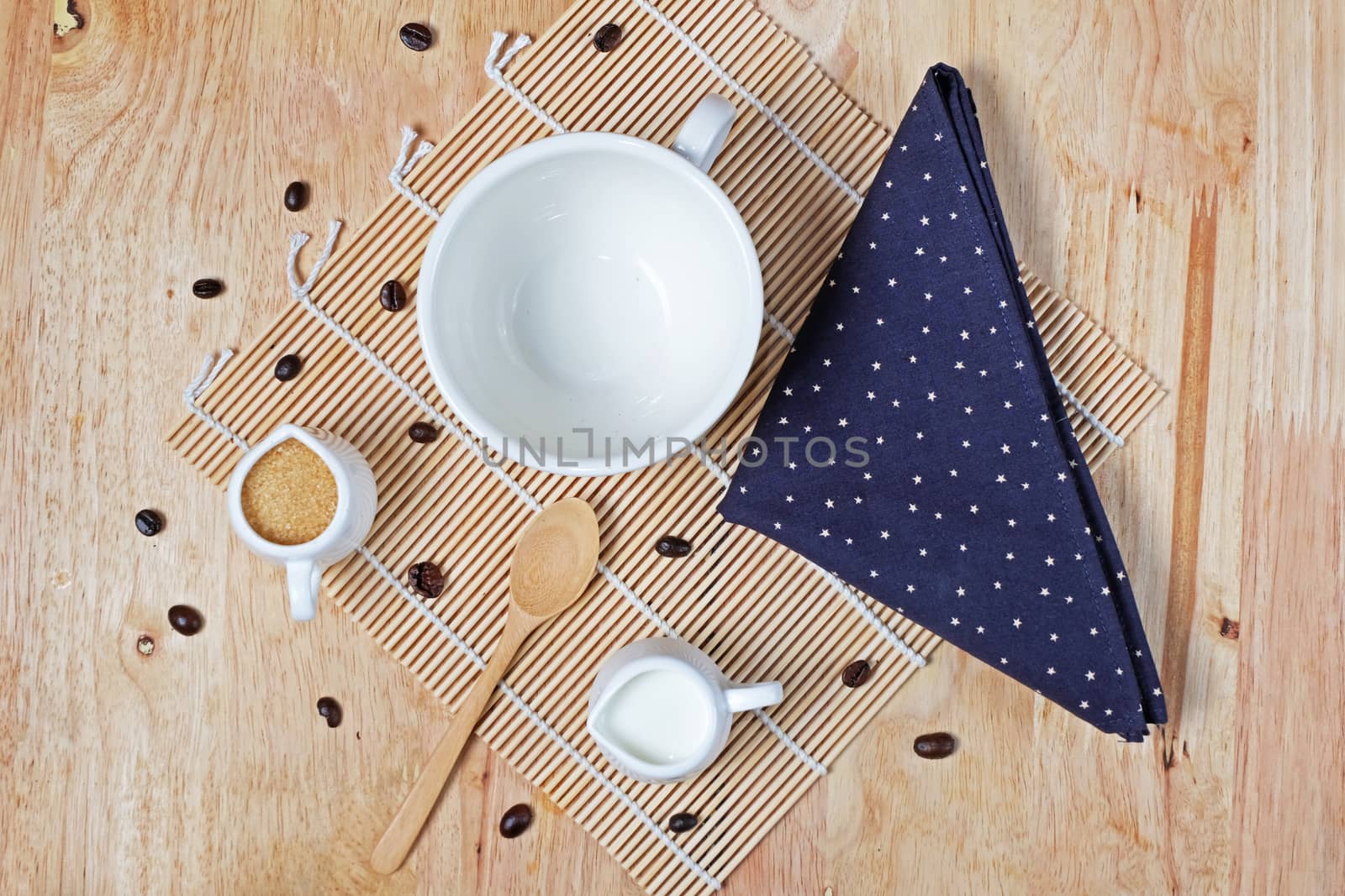 Empty cup coffee on wooden texture table by Surasak