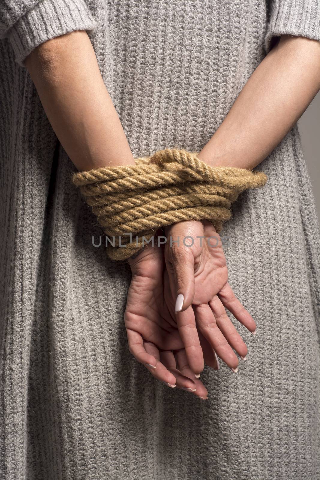Hands on back tied with a rope by adamr