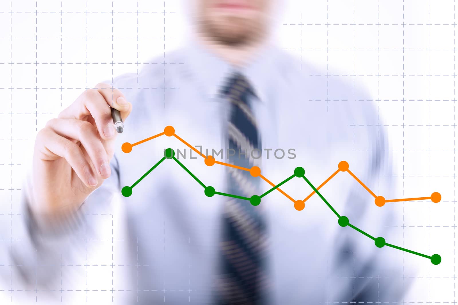 Business concept: Man drawing a chart with a digital pen