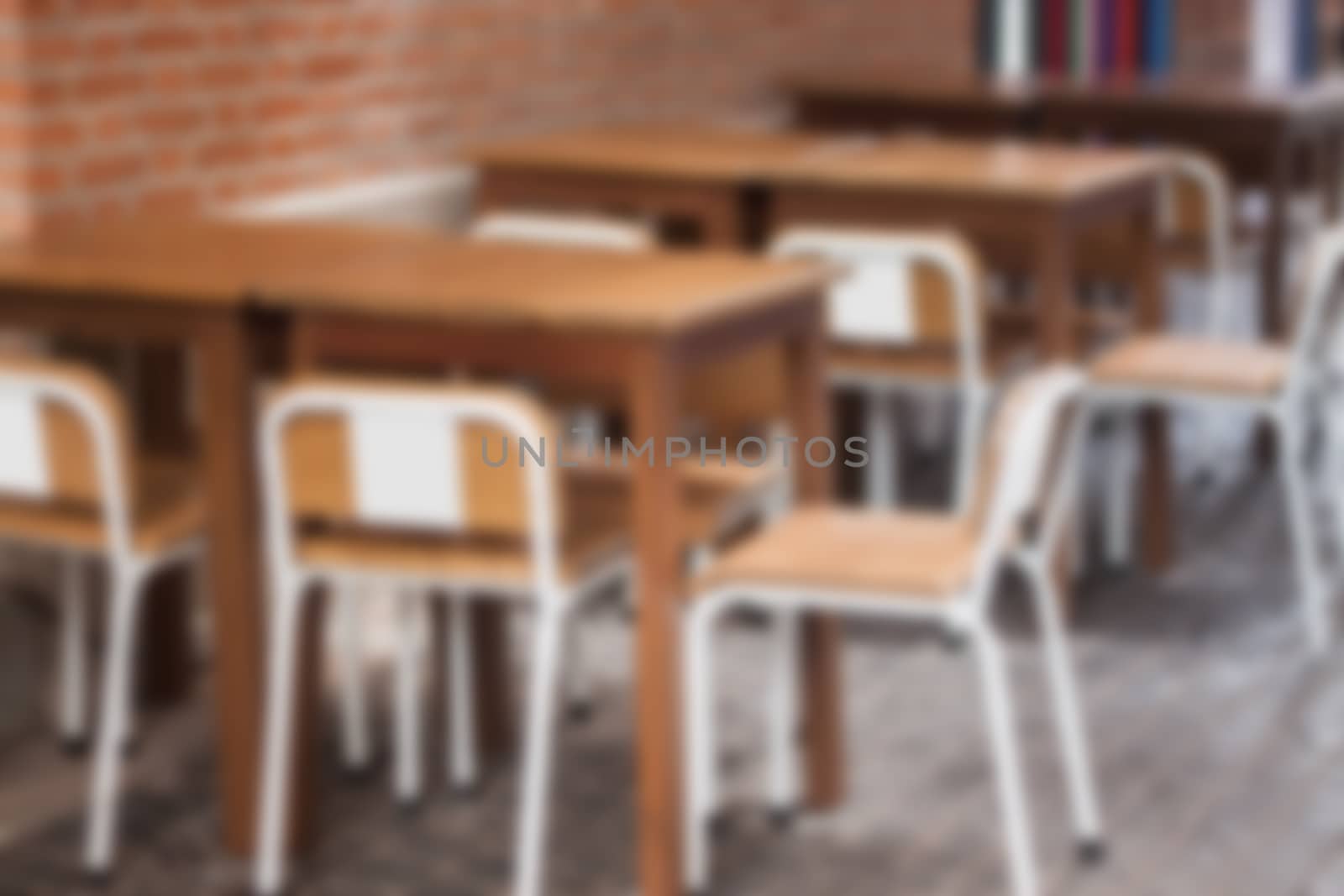 Wooden tables outside coffee shop by punsayaporn