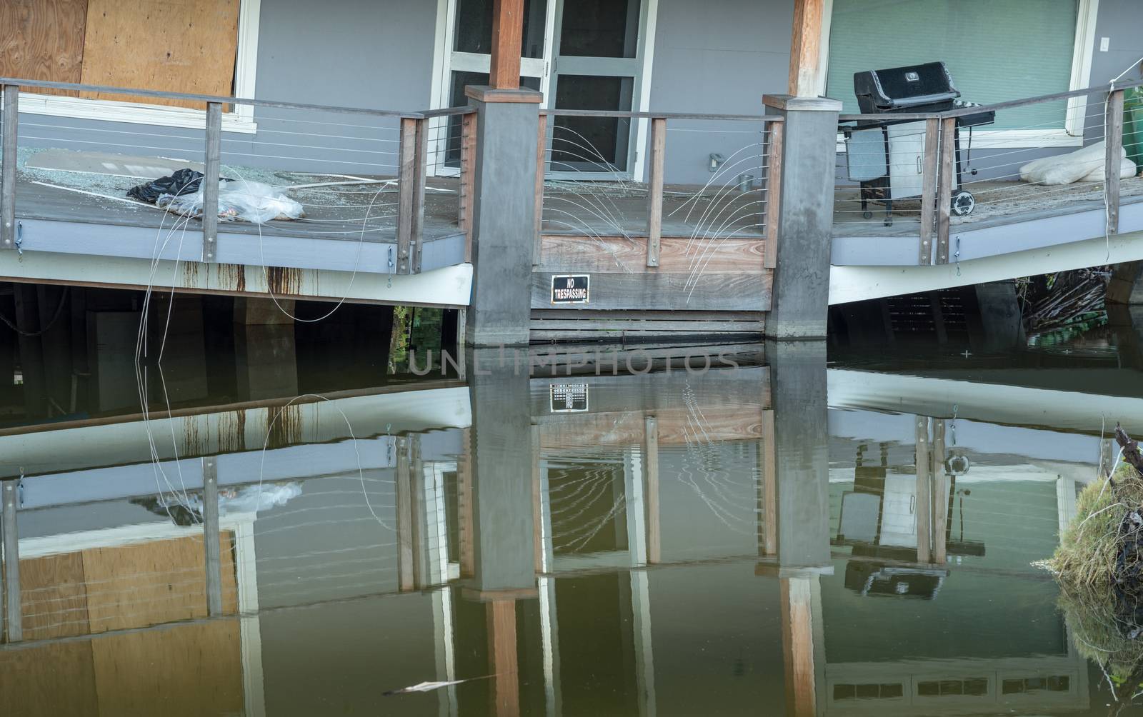 Balcony of beach home sinking into sink hole after the massive rain storms of April 2018 on Kauai