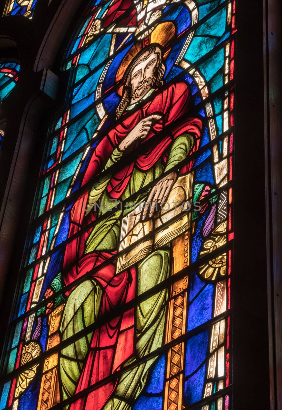 Colored light from stained glass window in methodist church