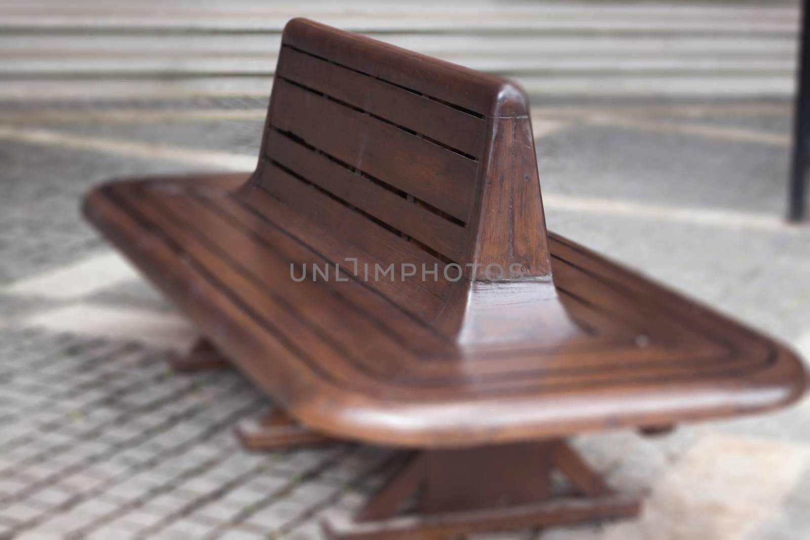 Wooden bench in the park by punsayaporn