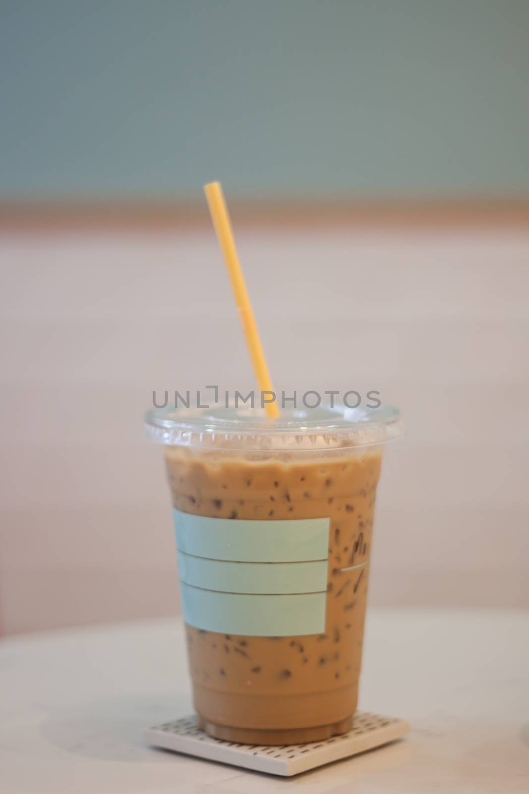 Iced coffee in coffee shop by punsayaporn