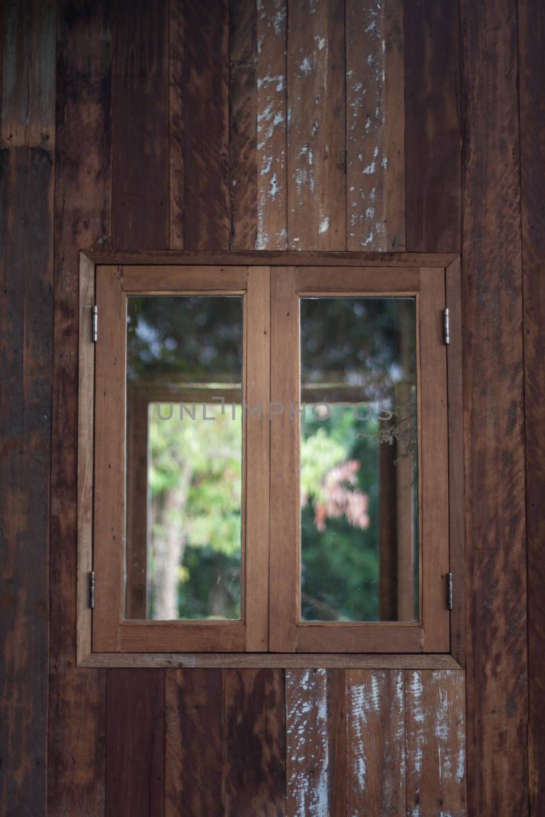 Wooden window frame on backyard, stock photo