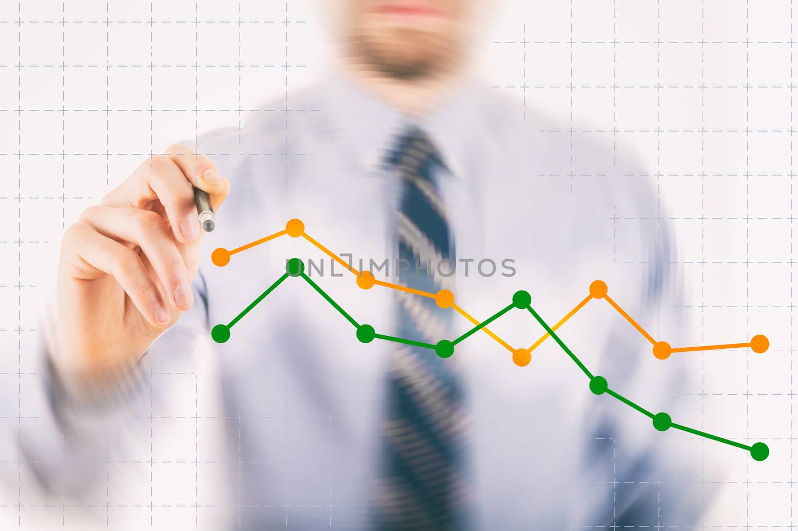 Business concept: Man drawing a chart with a digital pen