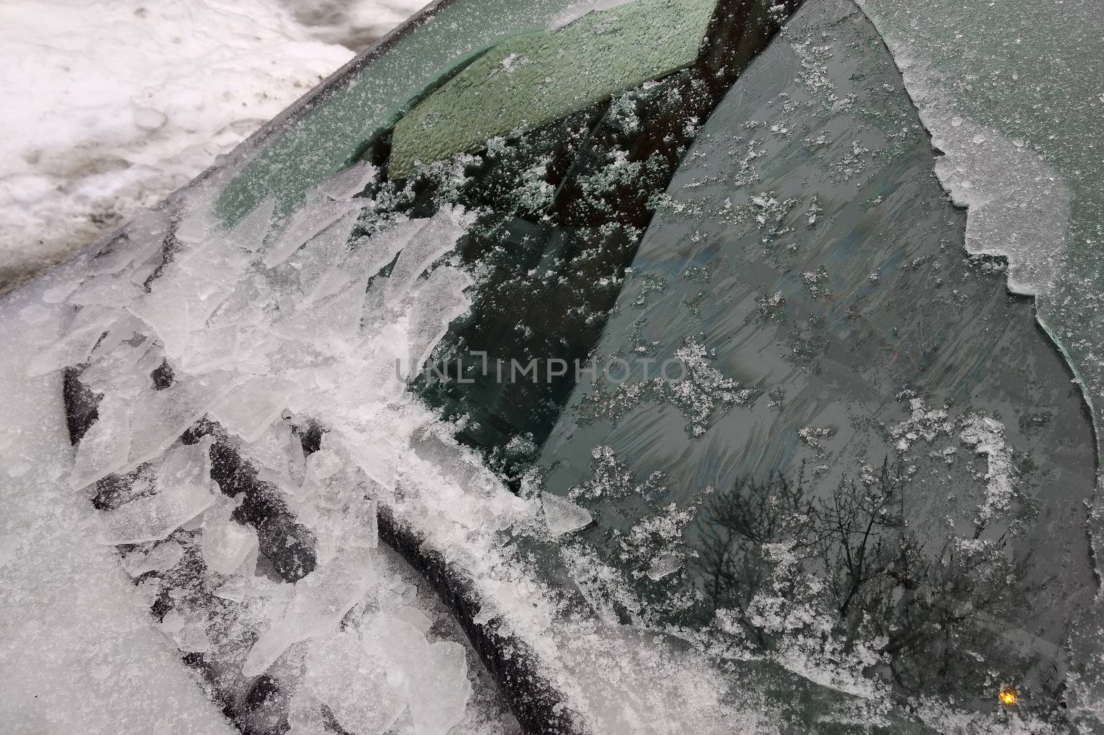 Thick layer of ice covering car after freezing rain in Montreal, Canada