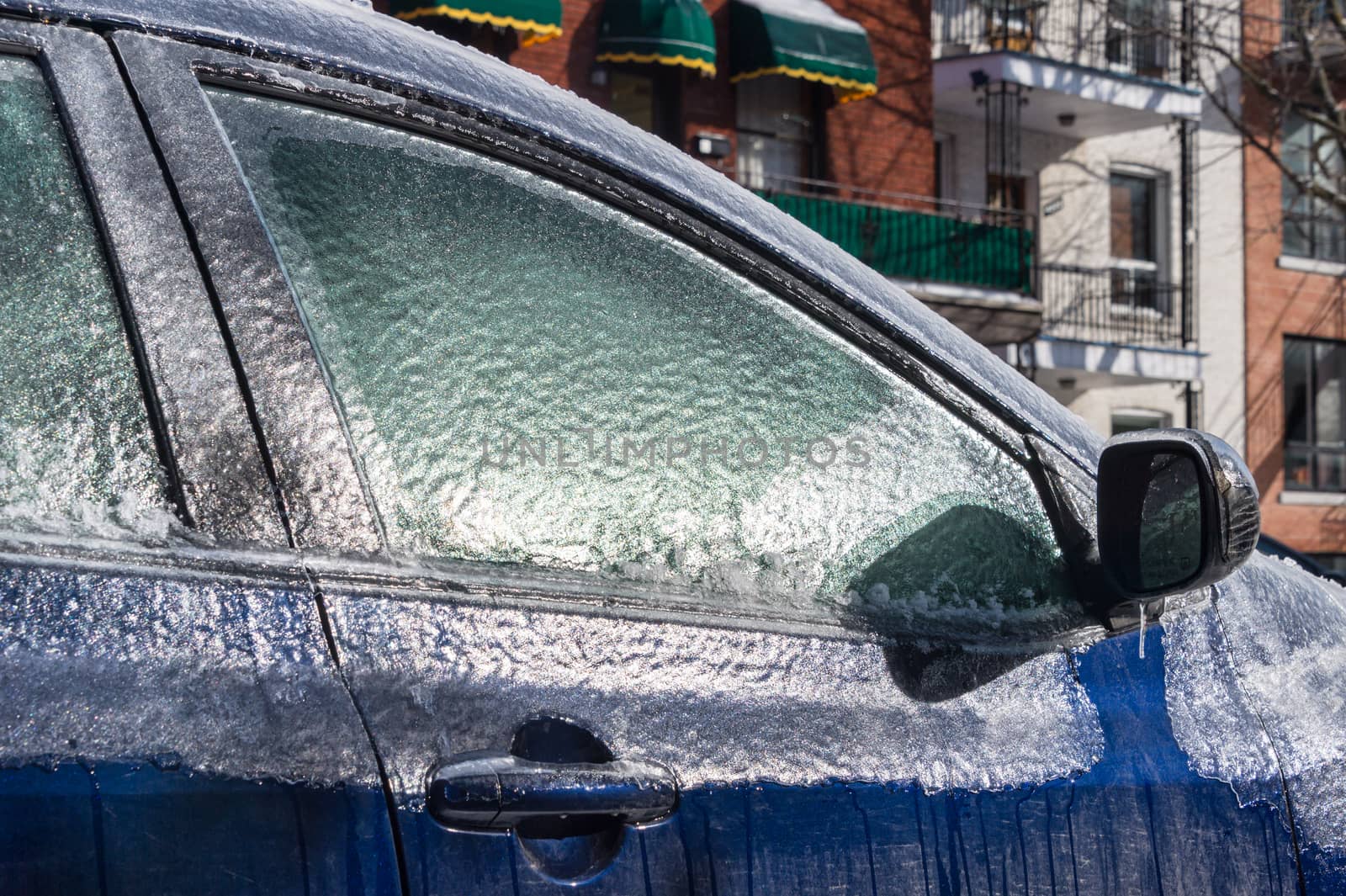 Thick layer of ice covering car after freezing rain in Montreal, Canada