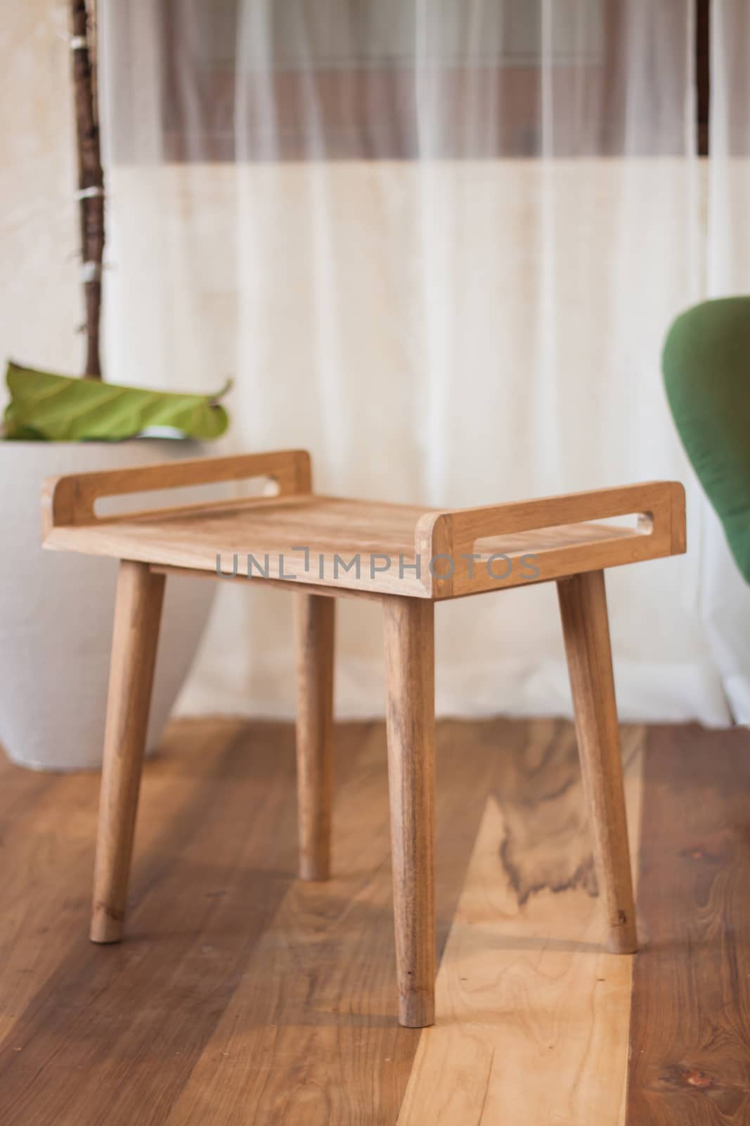 Wooden table decorated in coffee shop by punsayaporn