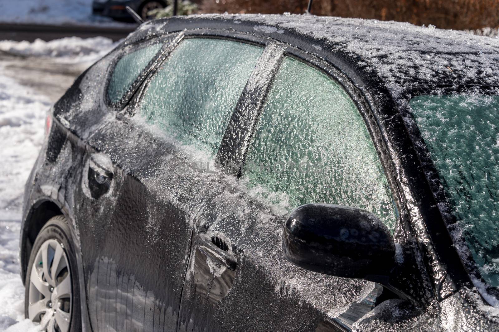 Thick layer of ice covering car after freezing rain in Montreal, Canada