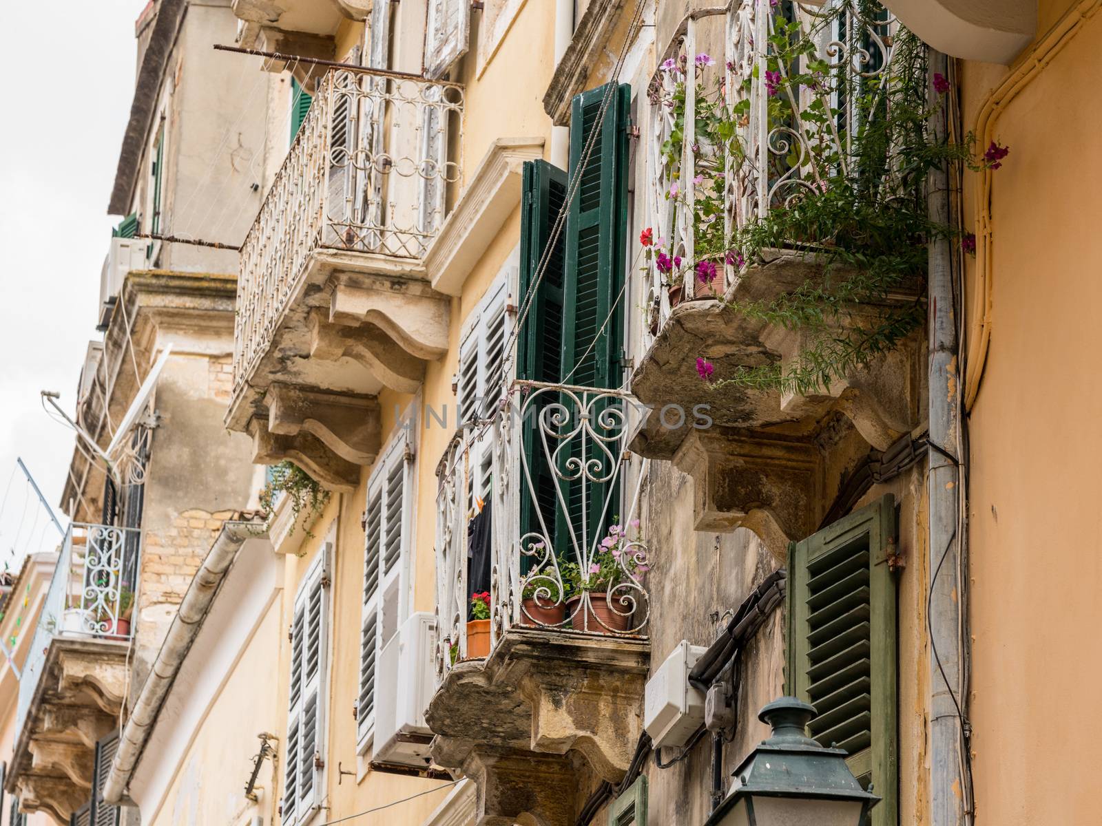 Old home and flowered balconies in Kerkyra