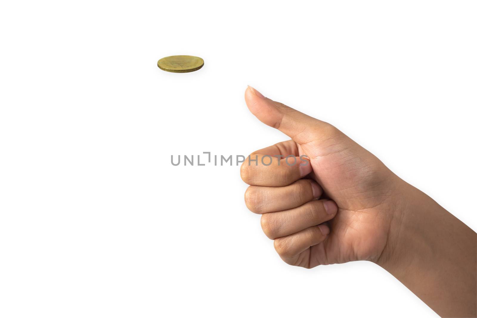 Hand of businessman tossing a golden coin isolated on white background.