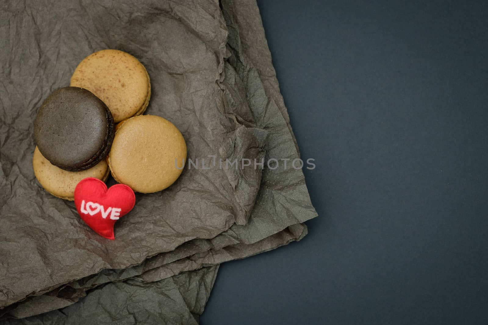 Macaroons on  table, Top view with copy space for your text, In low light.