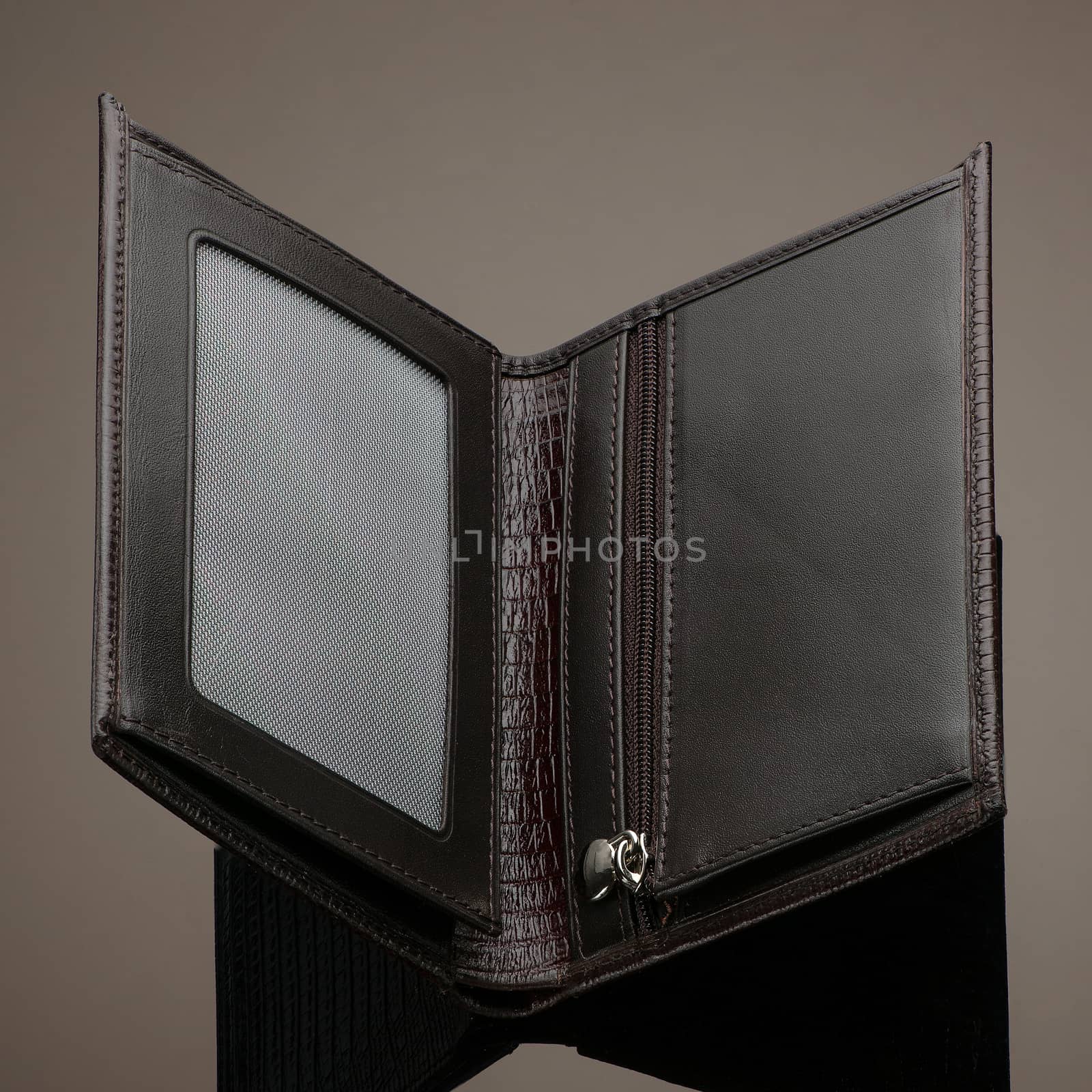 wallet on a brown background by A_Karim