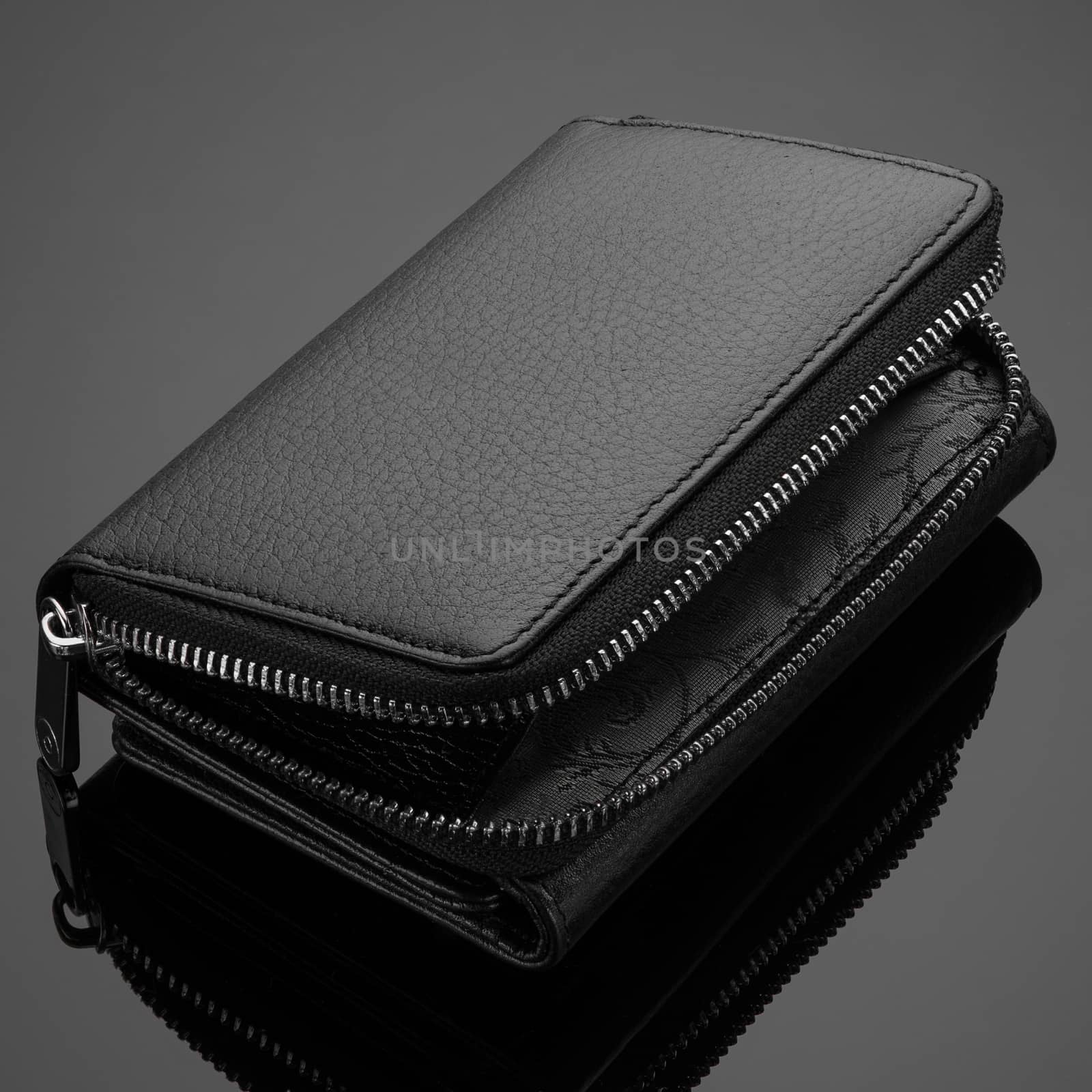 men's wallet on a black background by A_Karim