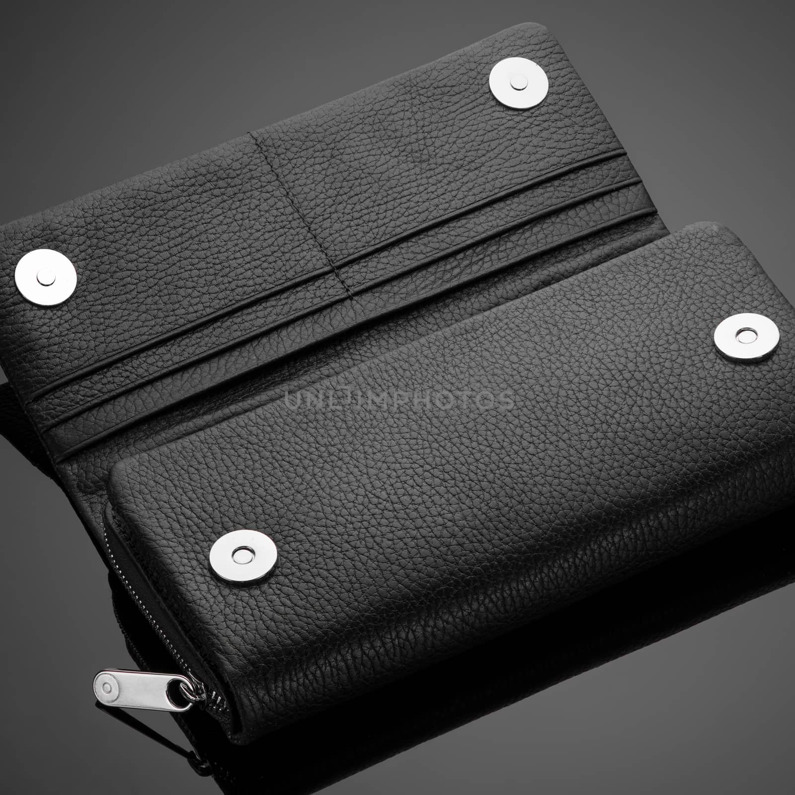 men's wallet on a black background by A_Karim