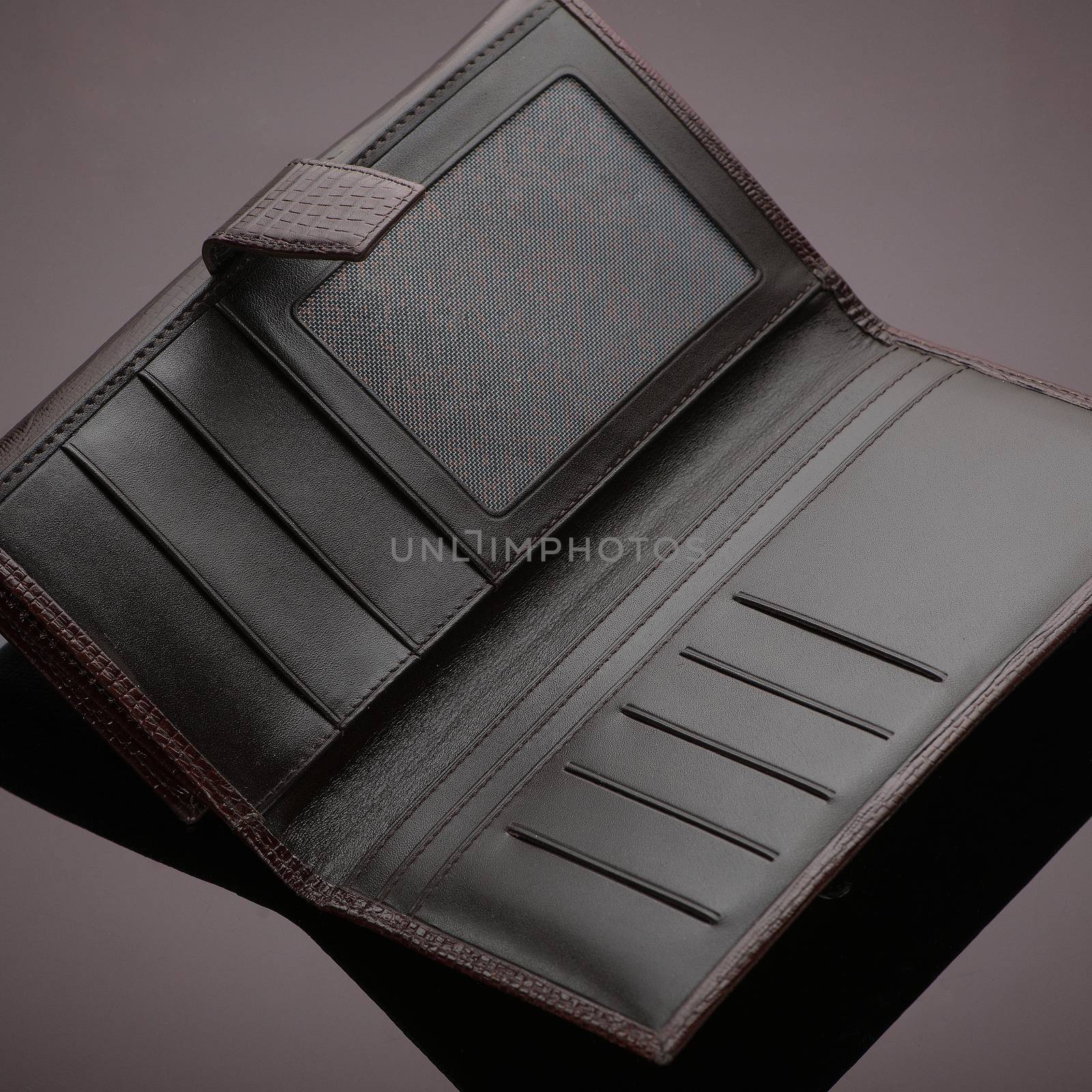 wallet on a brown background by A_Karim