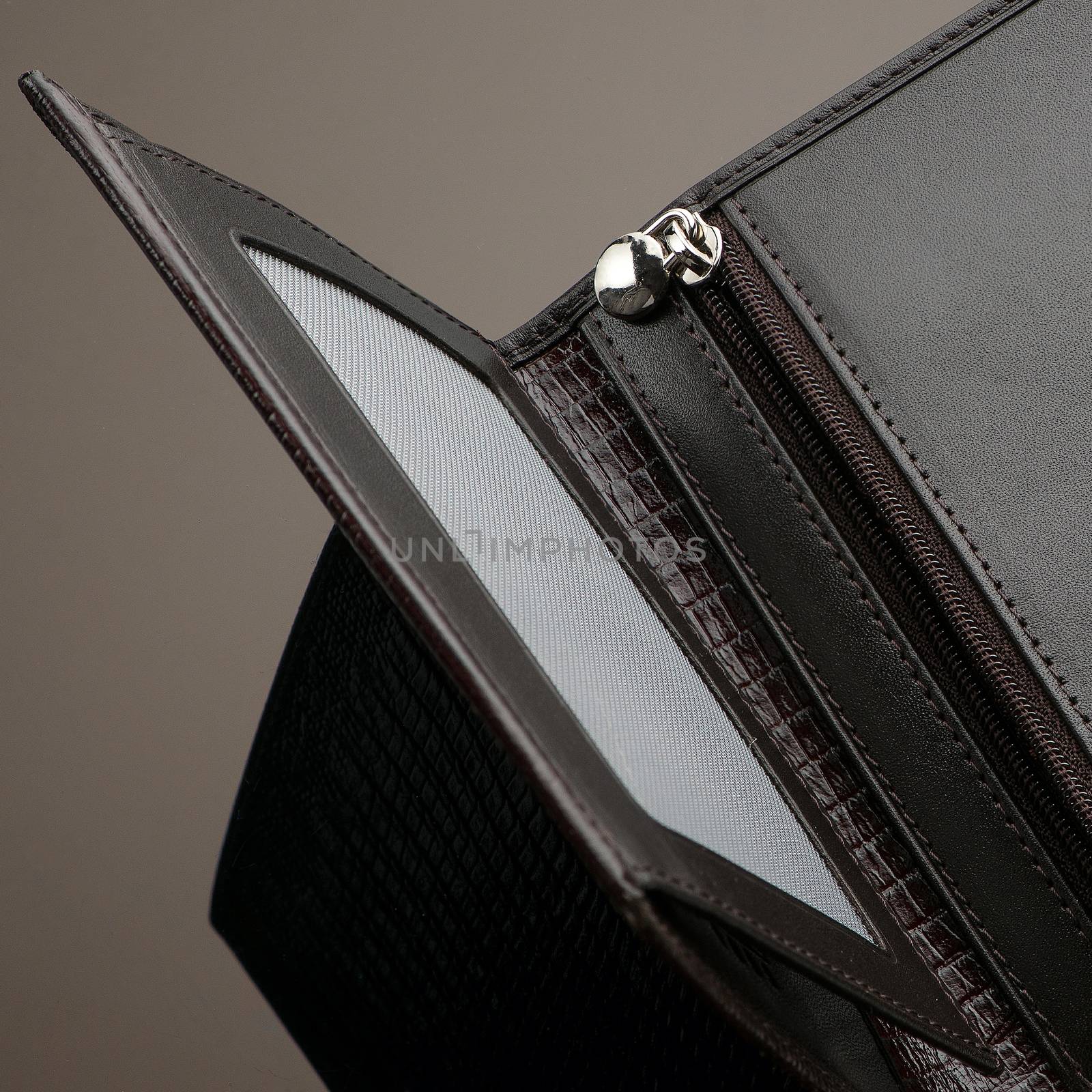 wallet on a brown background by A_Karim