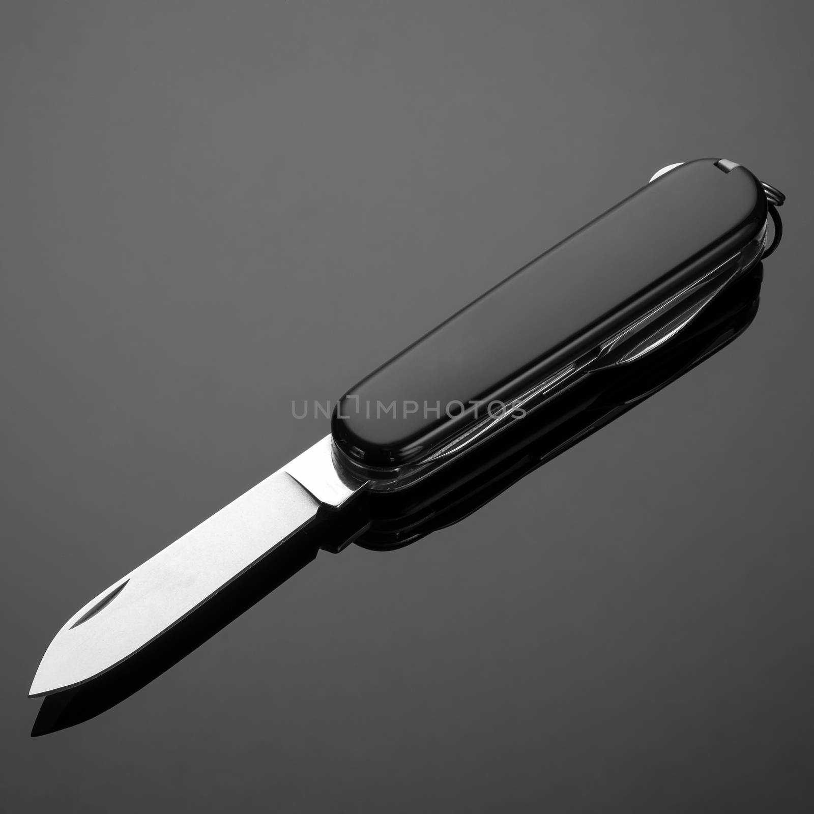 folding knife on a black background by A_Karim