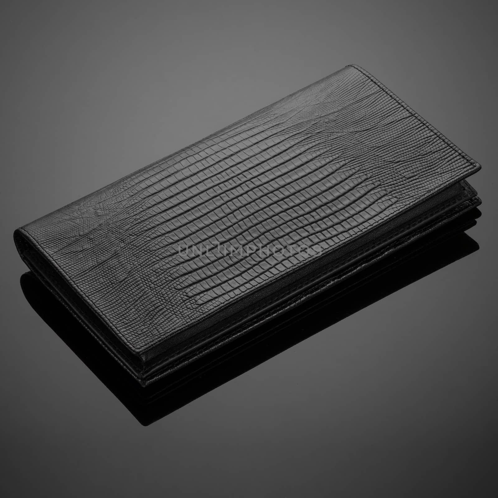 men's wallet on a black background by A_Karim