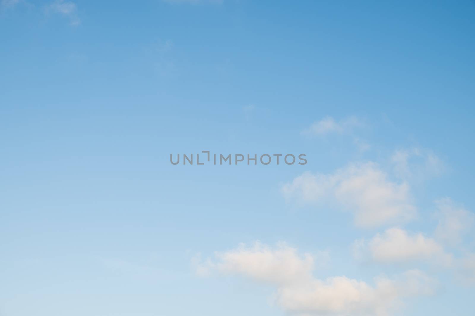 Blue sky with tiny clouds background,  Clearing day.