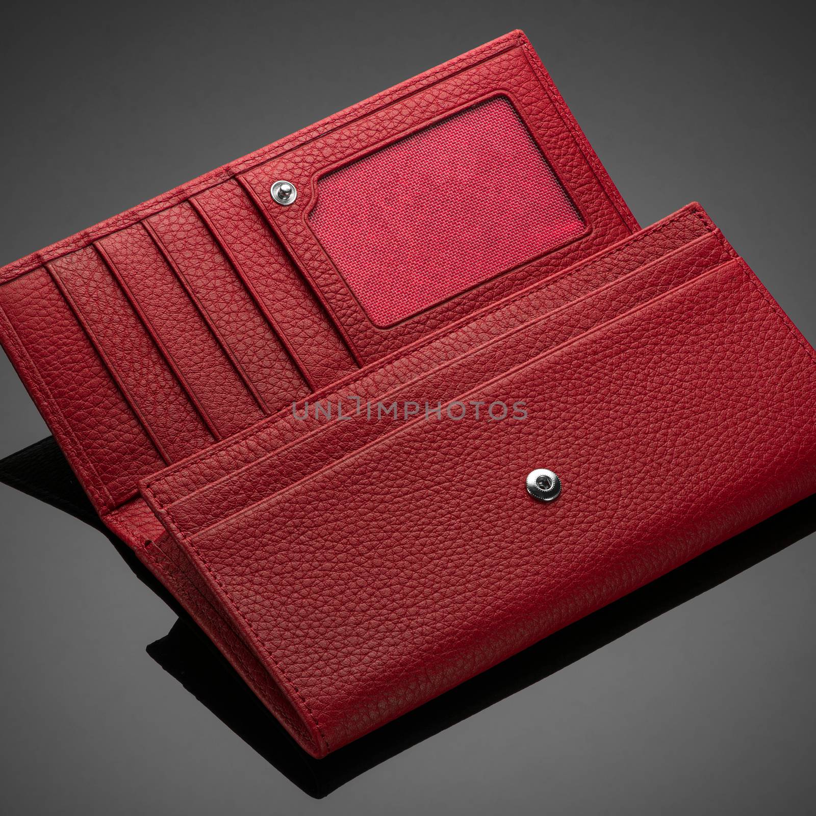 women's wallet on a black background by A_Karim
