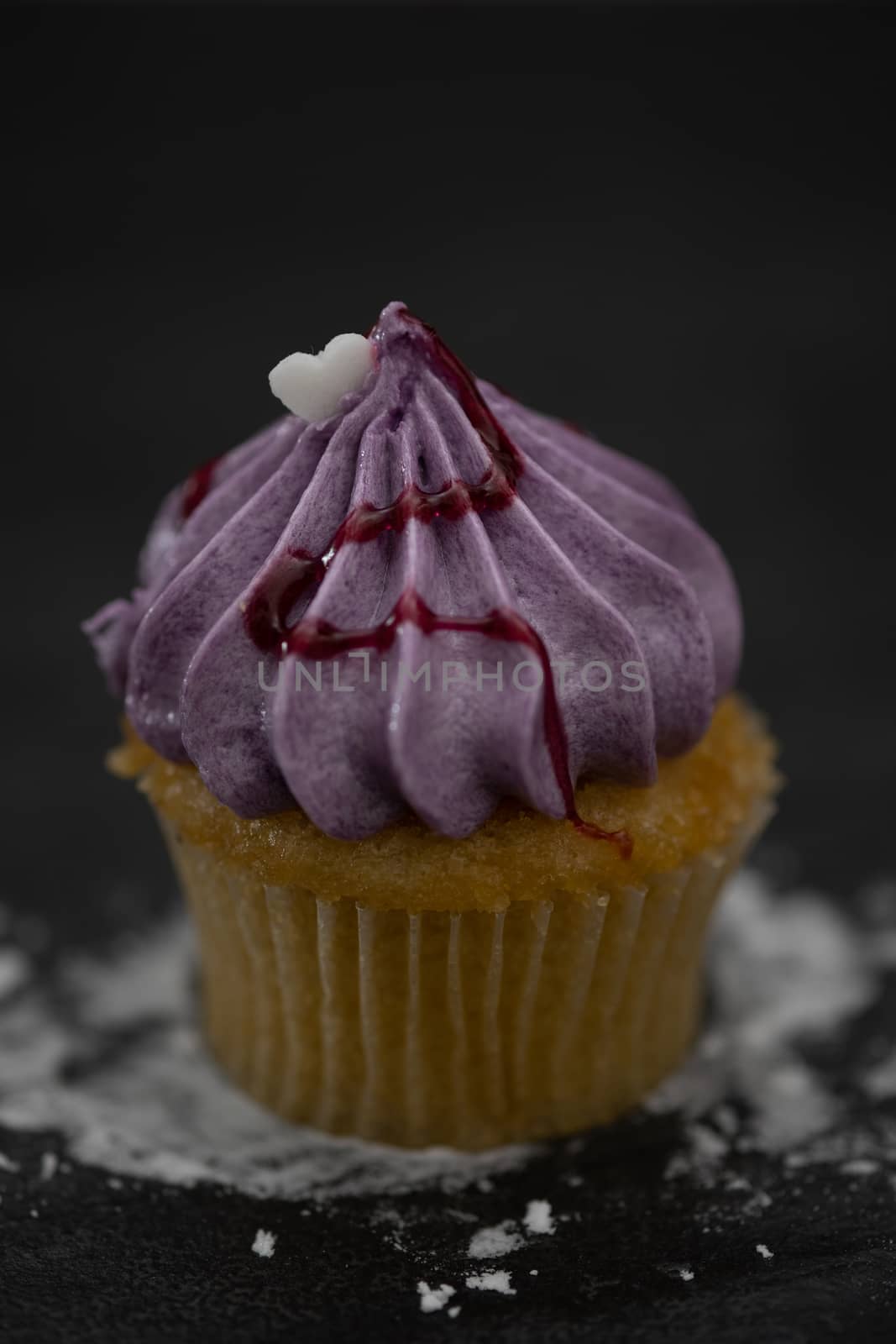 Tasty mini cupcakes on a vintage background, sweet dessert for christmas, new year and valentine holliday.