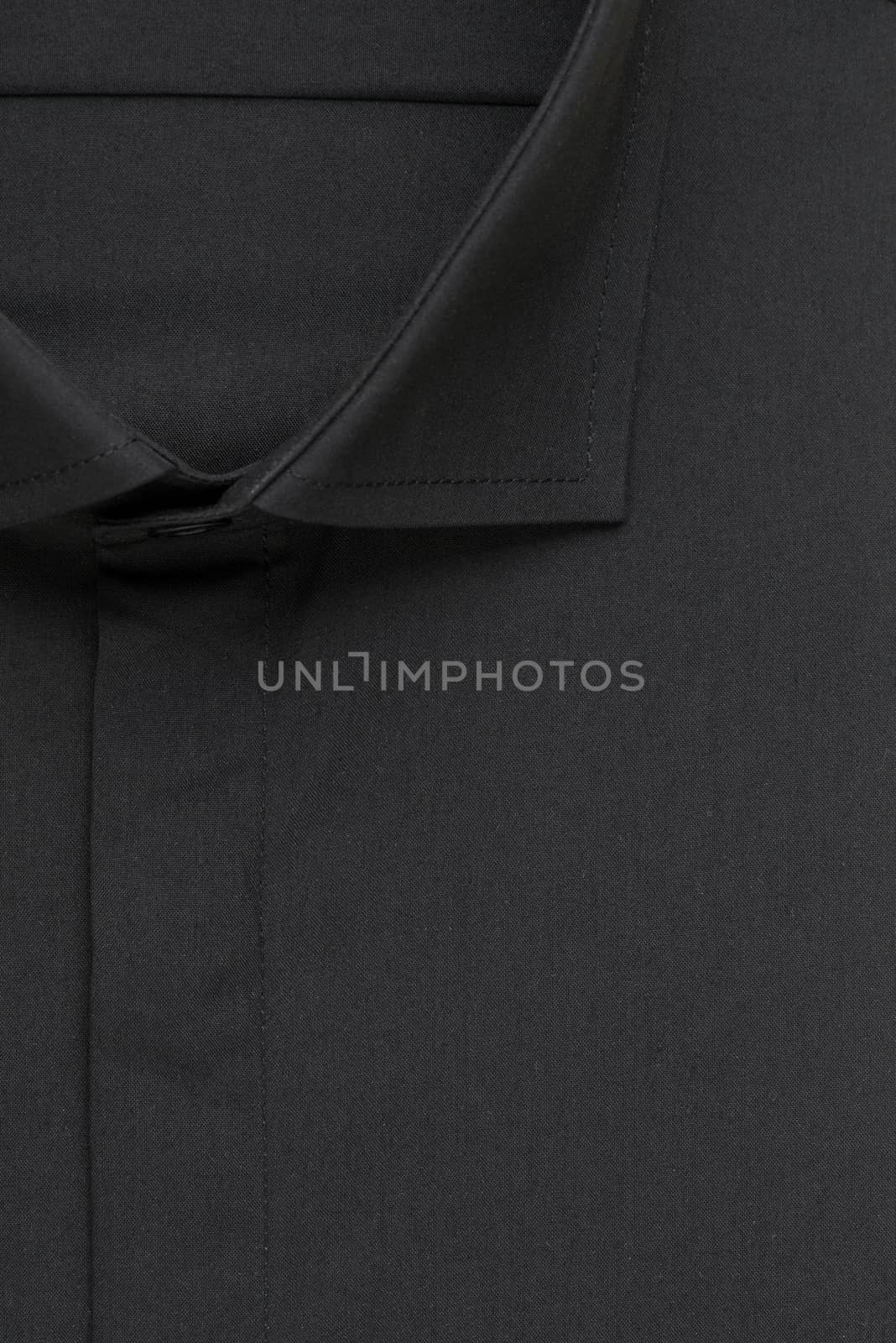 black shirt, detailed close-up collar and button, top view