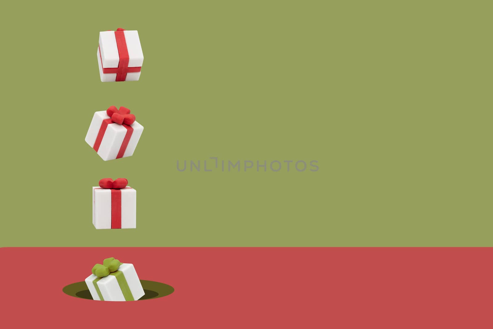 Christmas gift boxes is flying on pink and green backdrop, Minimal style with copy space.