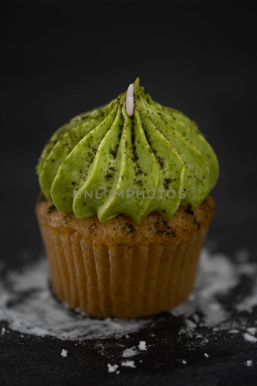 Tasty mini cupcakes on a vintage background, sweet dessert for christmas, new year and valentine holliday.