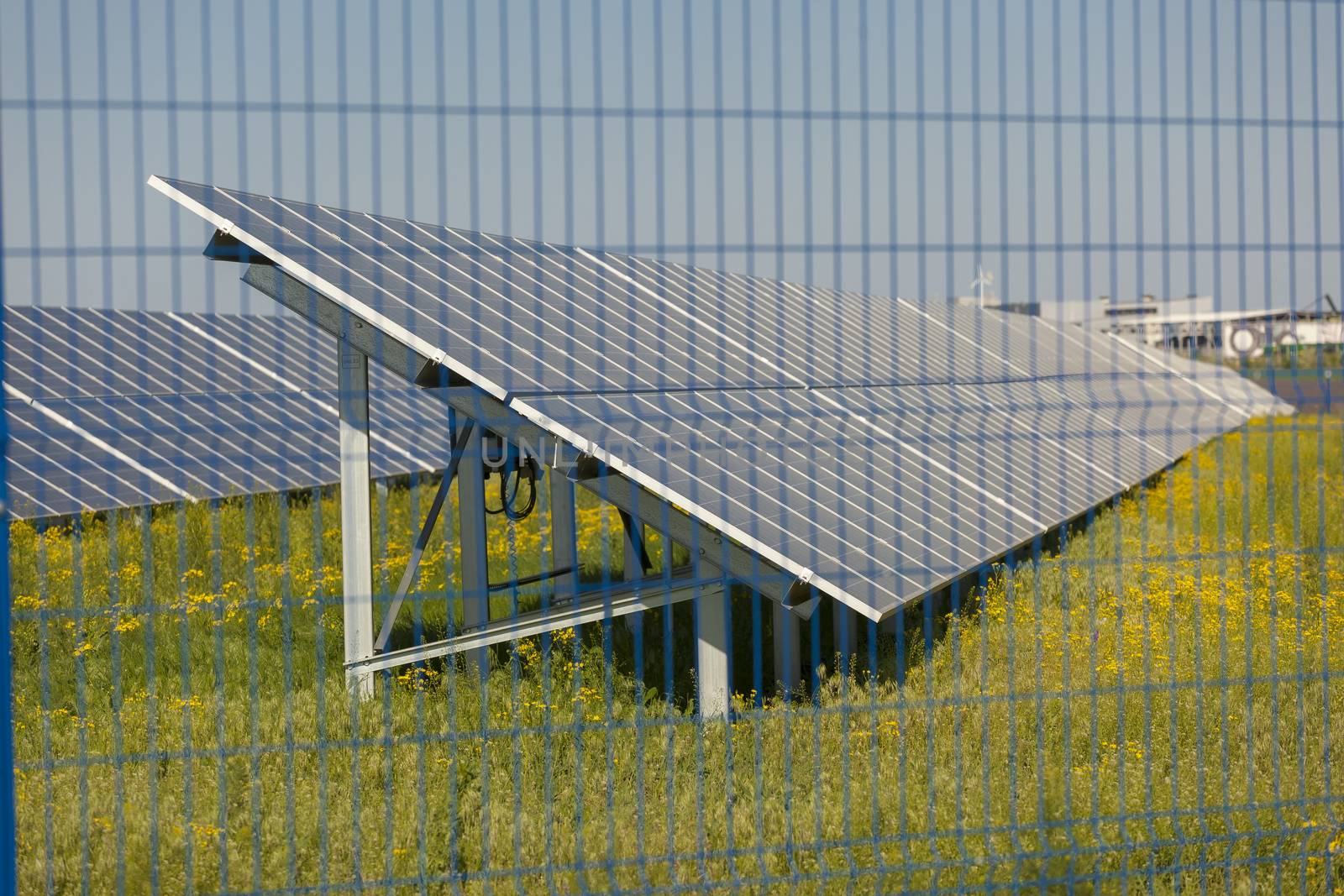 Grin clean electric power - Solar panel outside on grass photovoltaic