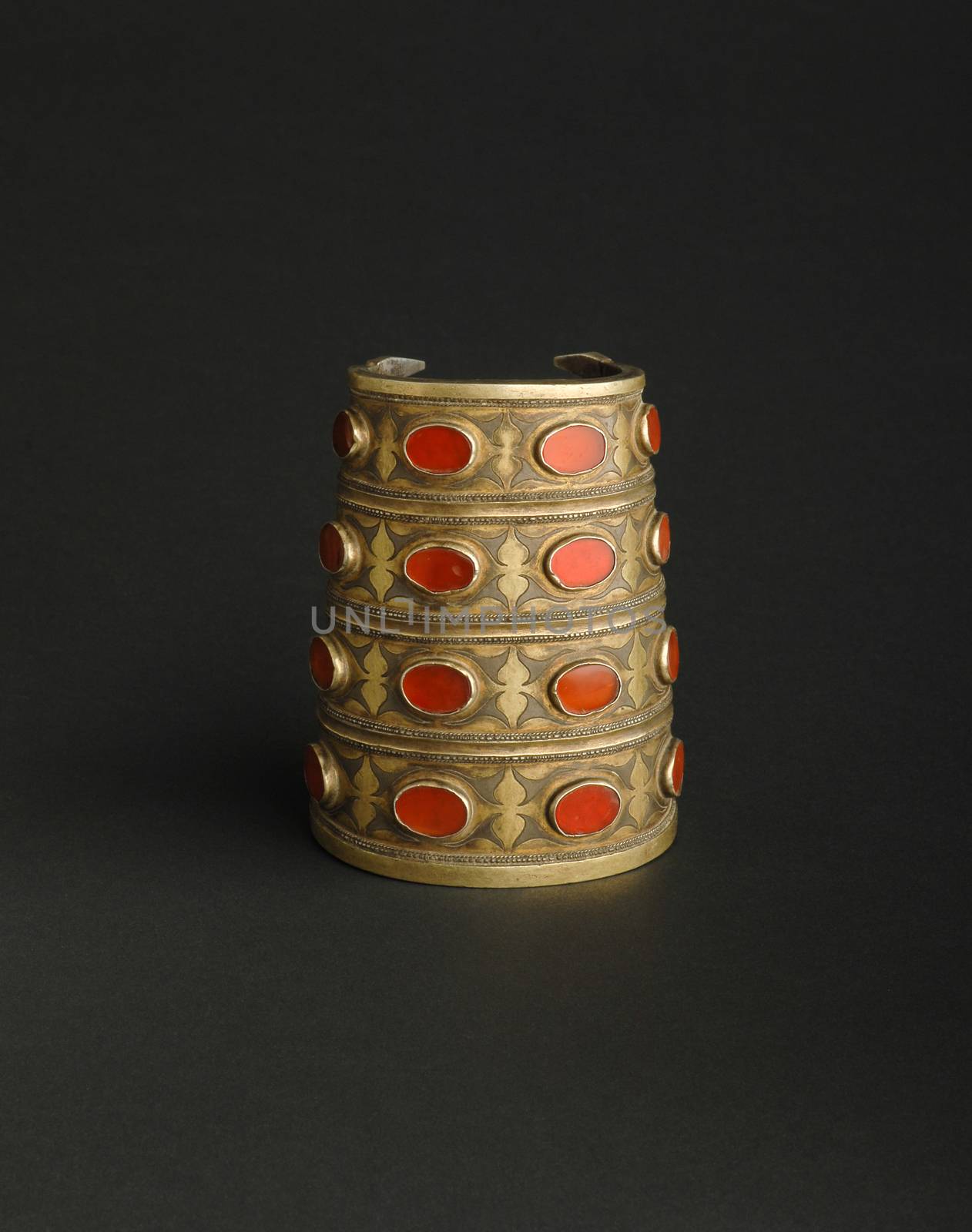 ancient antique bracelet with stones on black background. Middle-Asian vintage jewelry