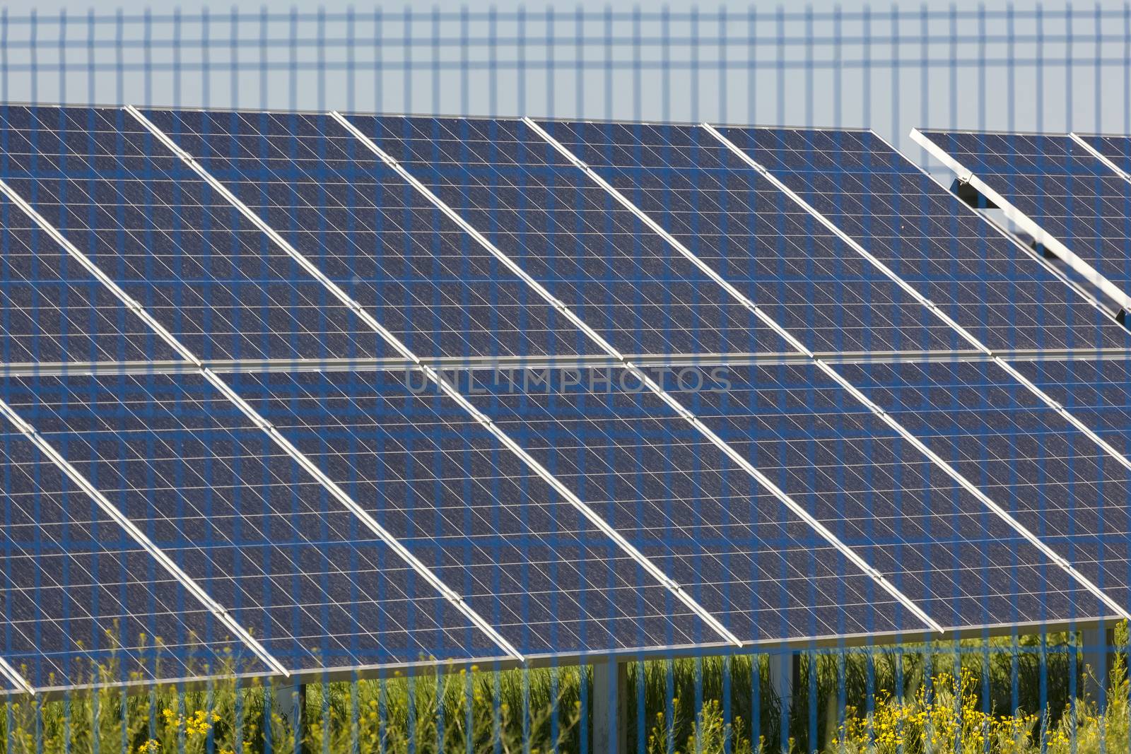 Grin clean electric power - Solar panel outside on grass photovoltaic