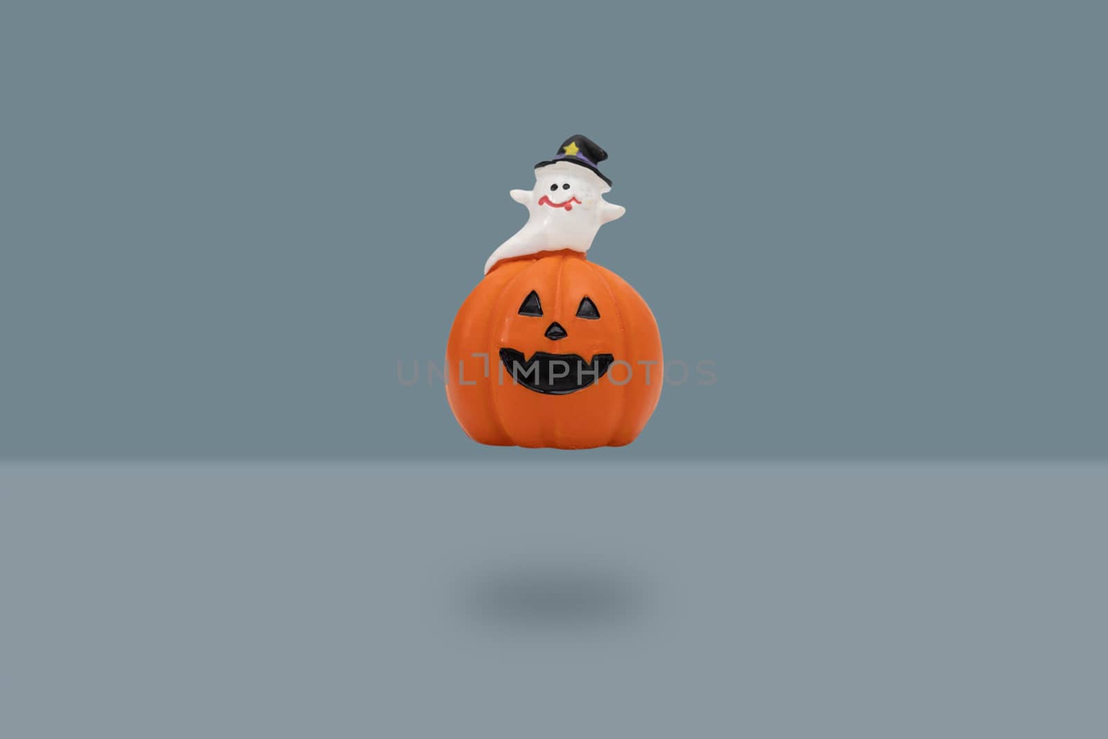 Halloween pumpkin on blue background by feelartfeelant