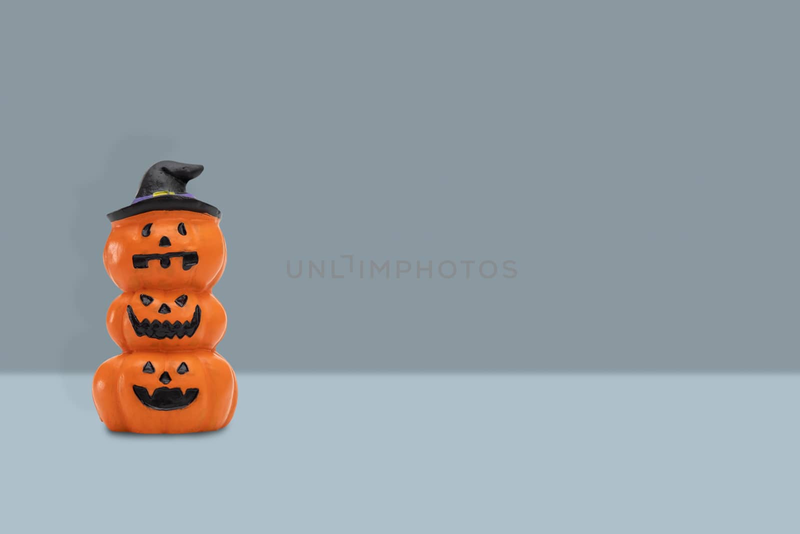 Halloween pumpkin on blue background by feelartfeelant