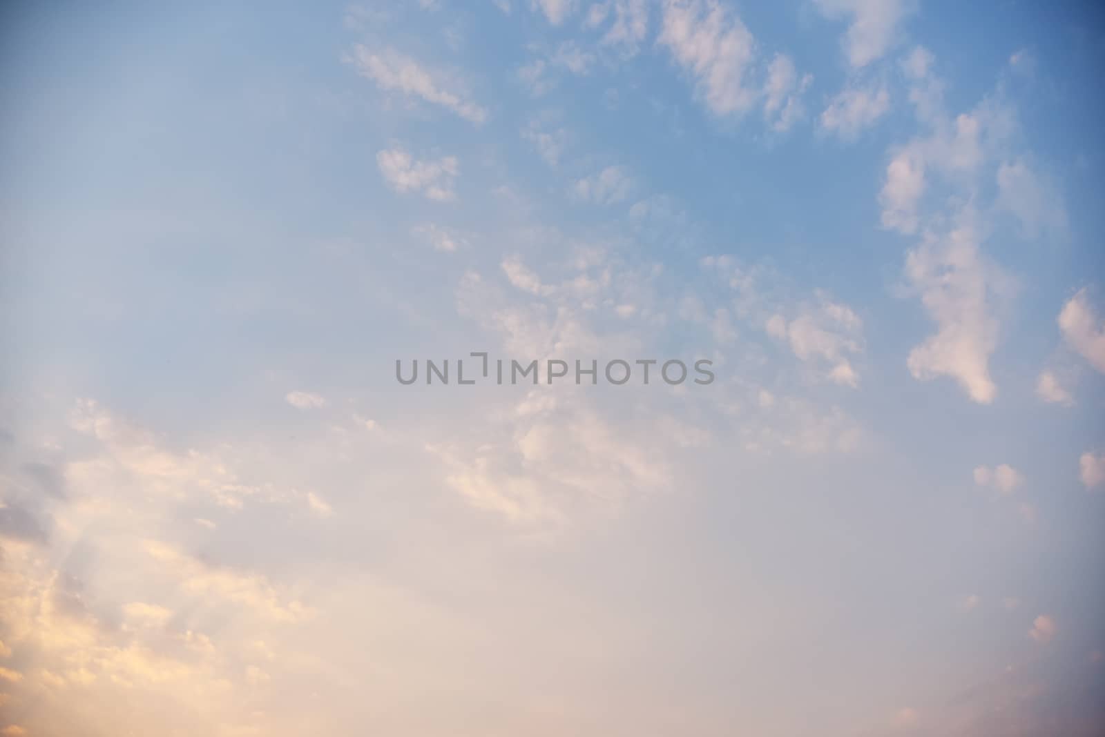 Beautiful sky and colorful clouds at sunset. Nature abstract composition with dramatic light. copy space