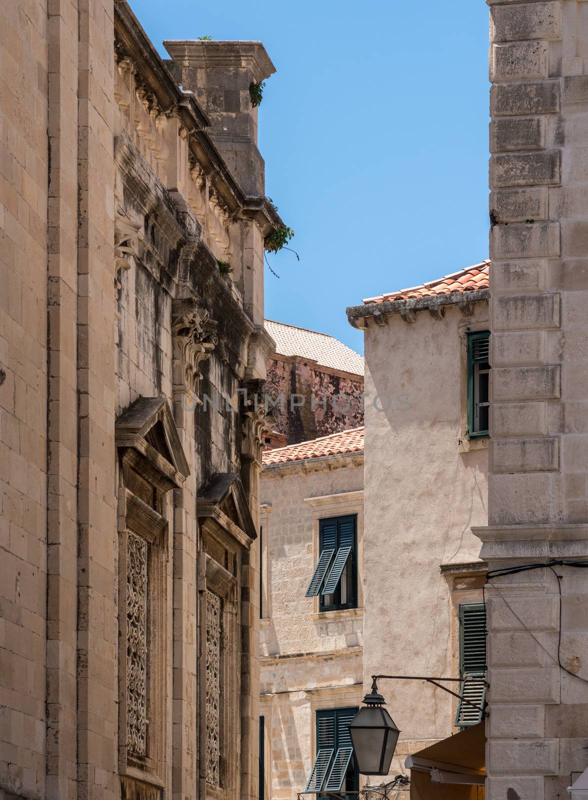 Narrow street in Dubrovnik old town by steheap