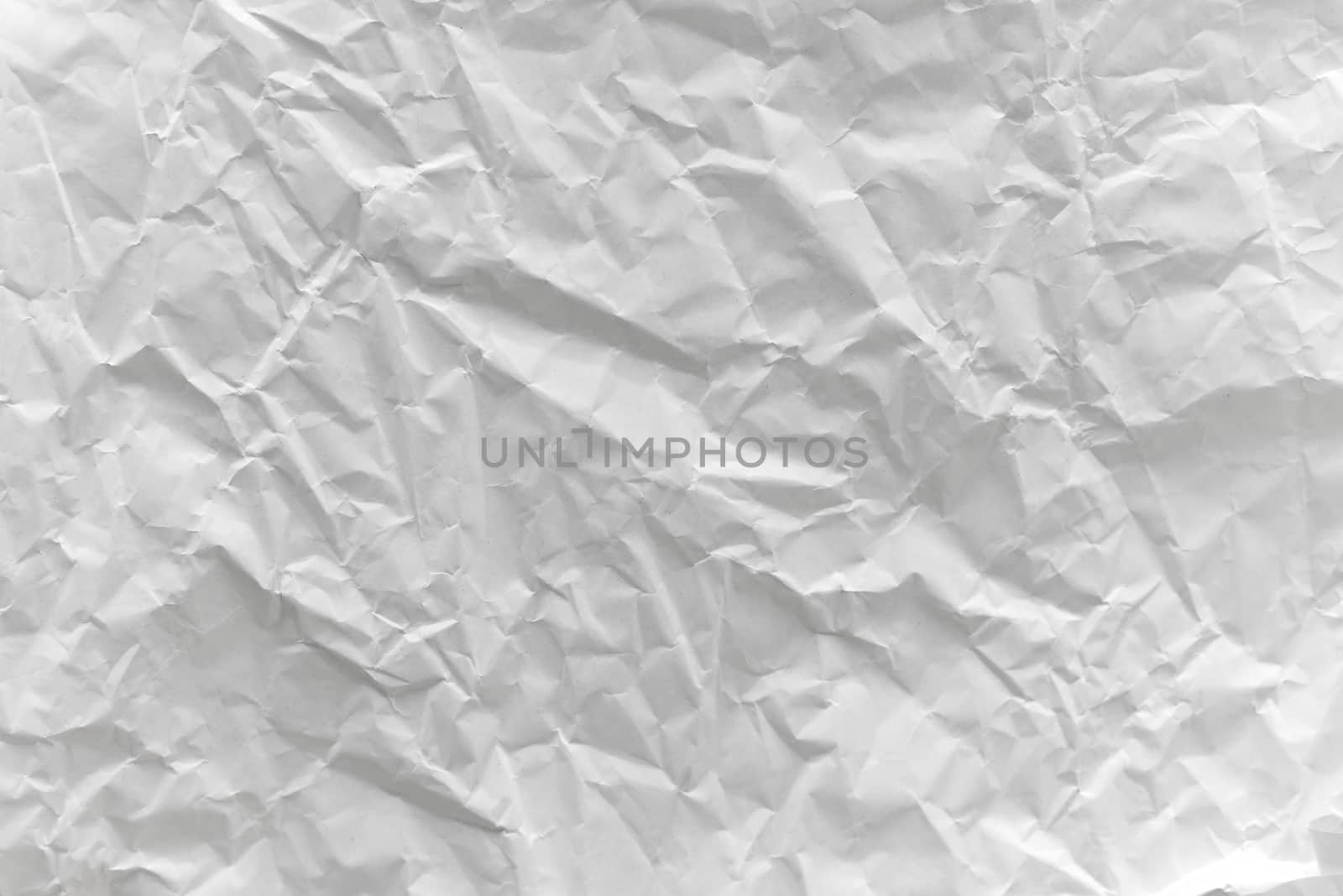 Wrinkled creases on white paper or White crumpled paper texture background.
