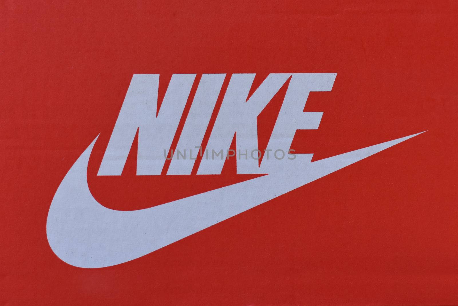 Loei, THAILAND - MARCH 27, 2020:Nike brand logo on the Red box of shoes. Nike company, a world-renowned manufacturer of sports clothing and footwear. is engaged sales of footwear, apparel and services