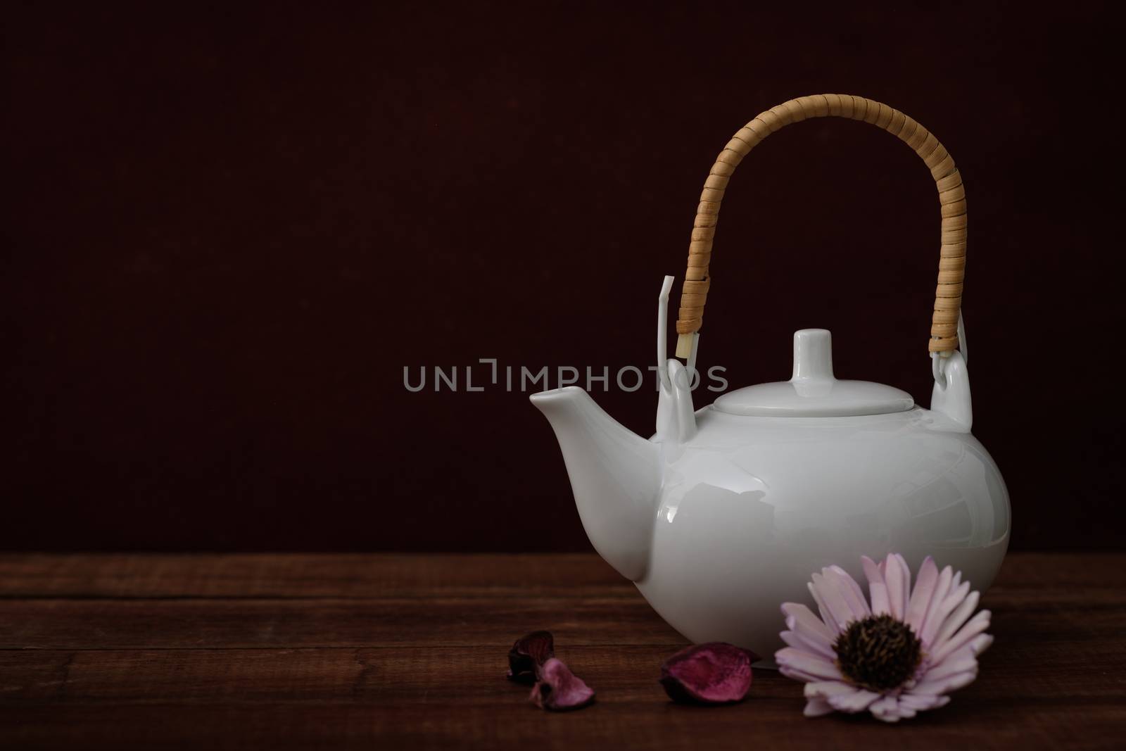 Still life the teapot on rustic wooden table, Choose a focal point, copy space for write.