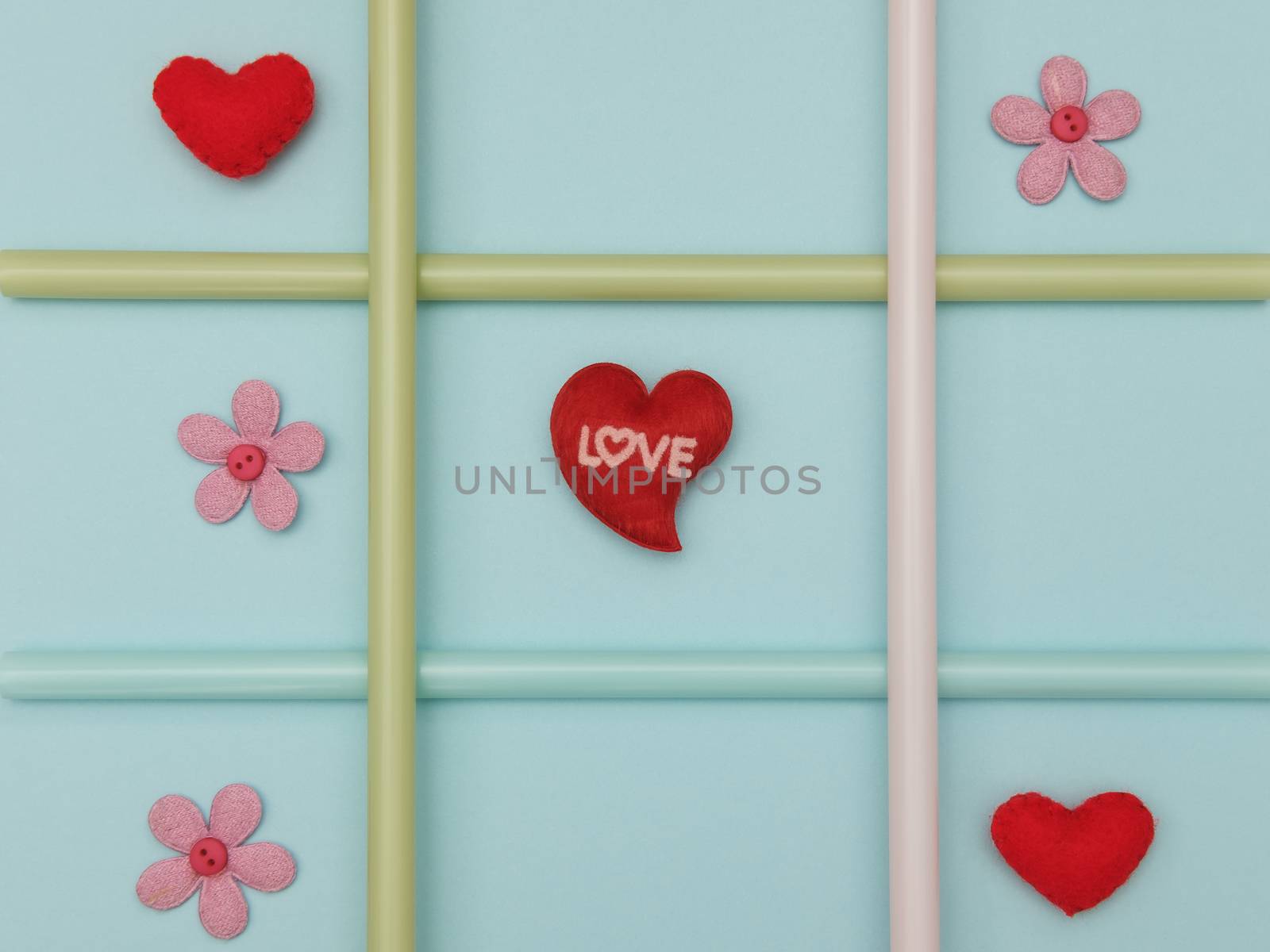 tic tac toe with valentine concept on blue background