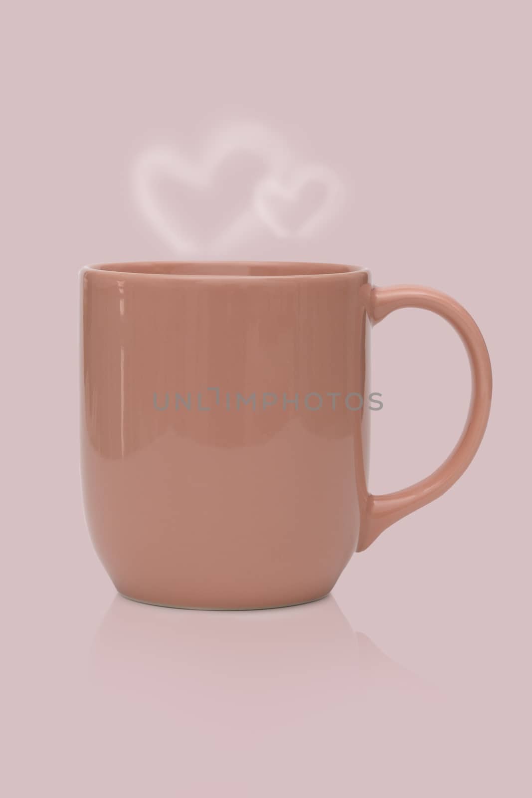 Pink ceramic mug or Coffee cup with heart smoke isolated on pink background.