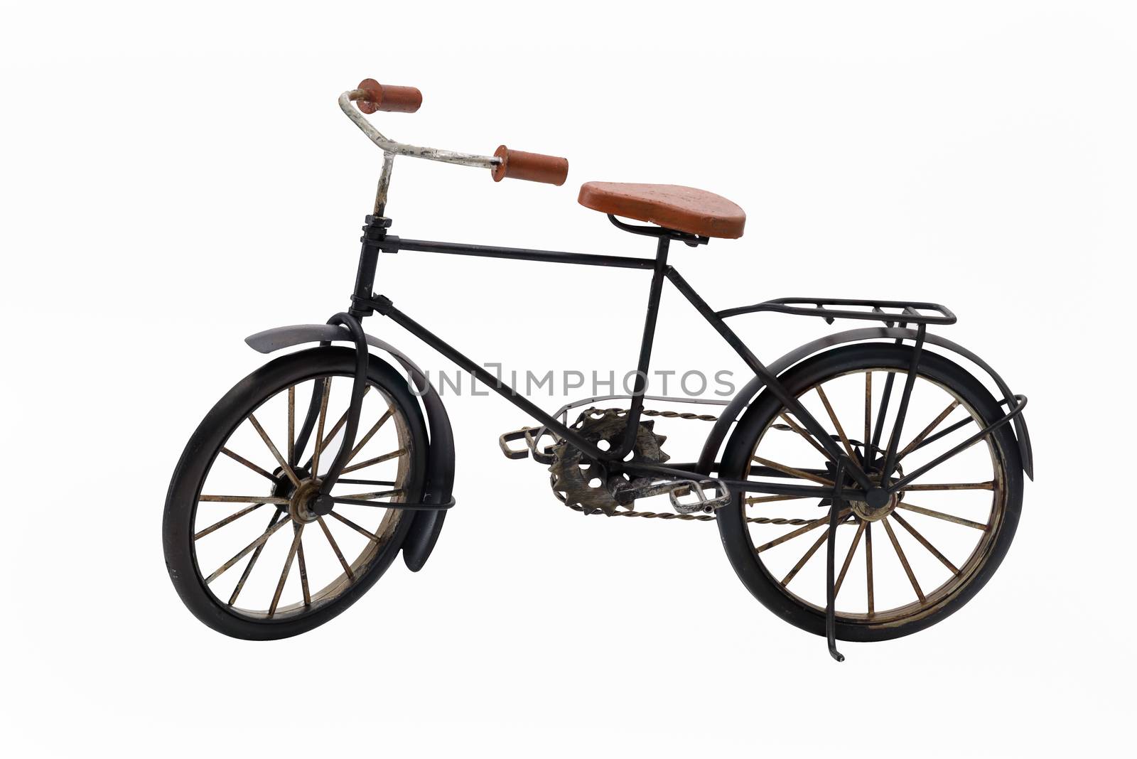 Antique bicycle isolated on white background.