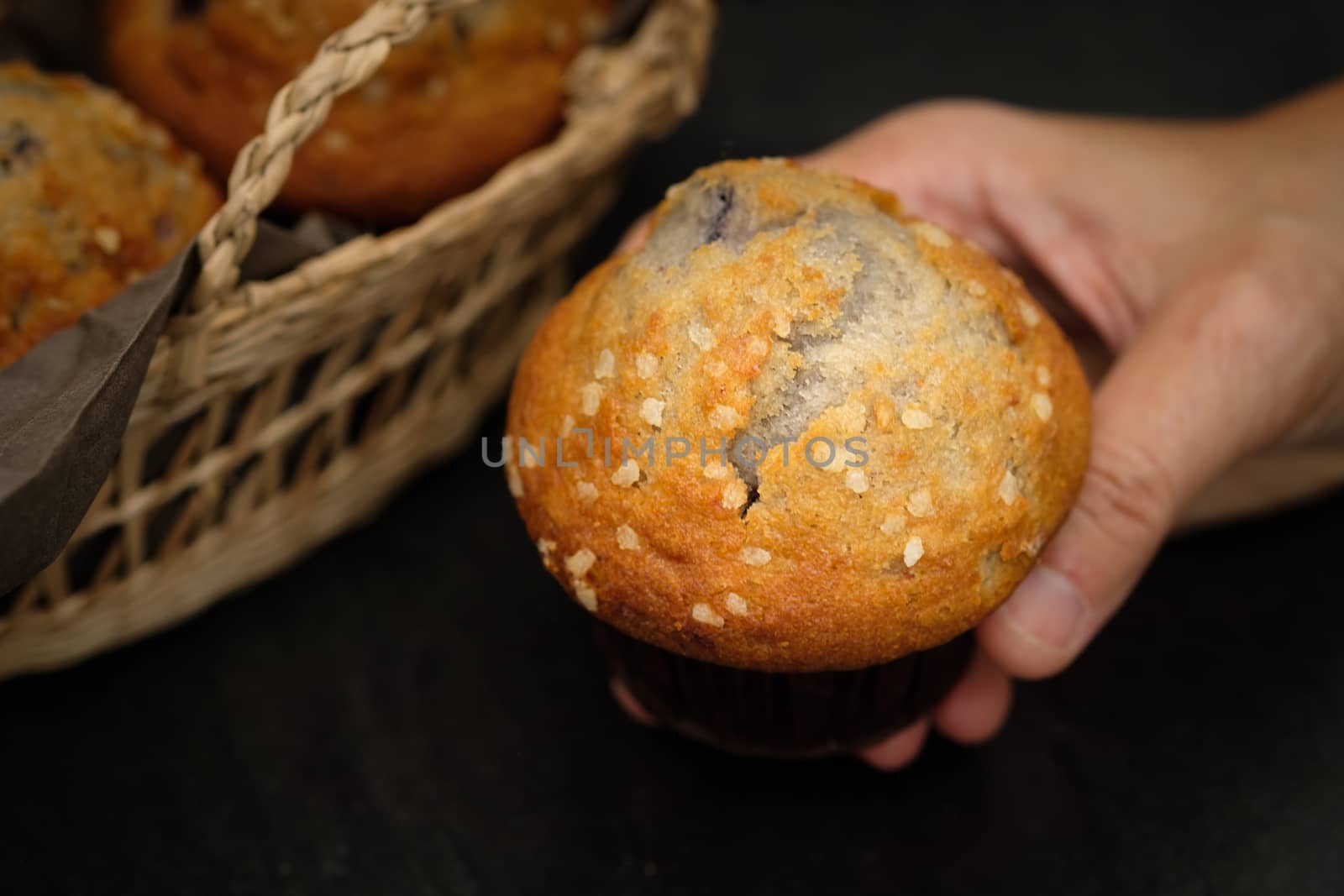 Still life blueberry muffins in a rustic style. Select the focus point.