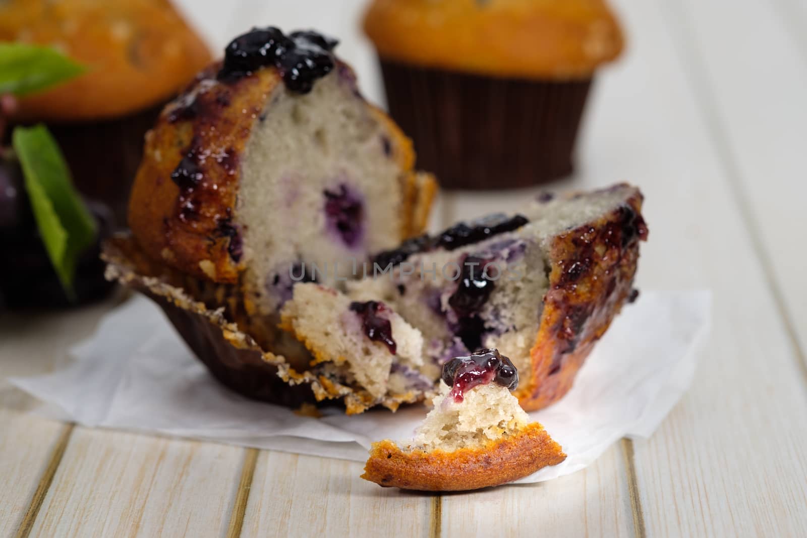 blueberry muffins in a rustic style. Select the focus point.