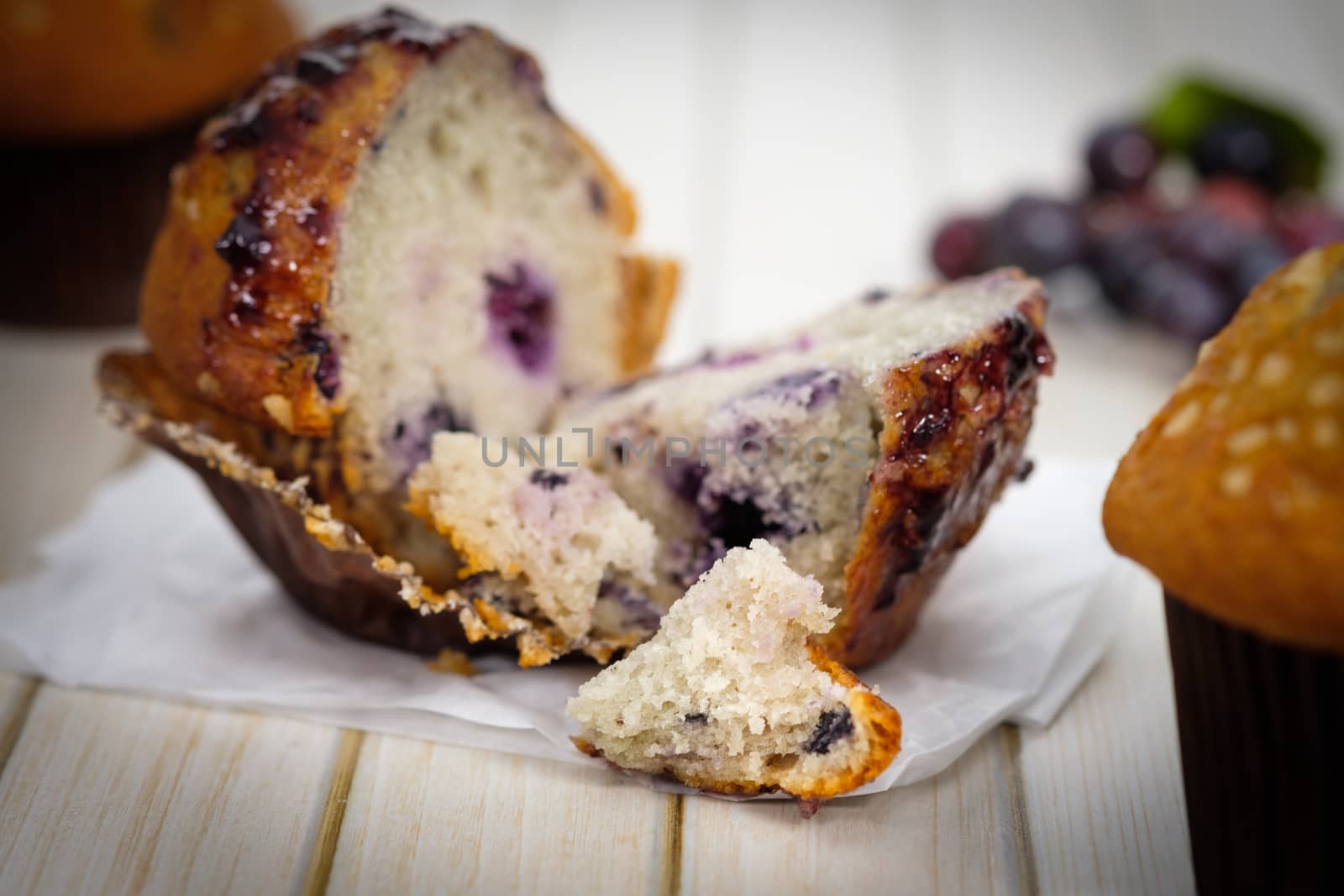 blueberry muffins in a rustic style. Select the focus point.