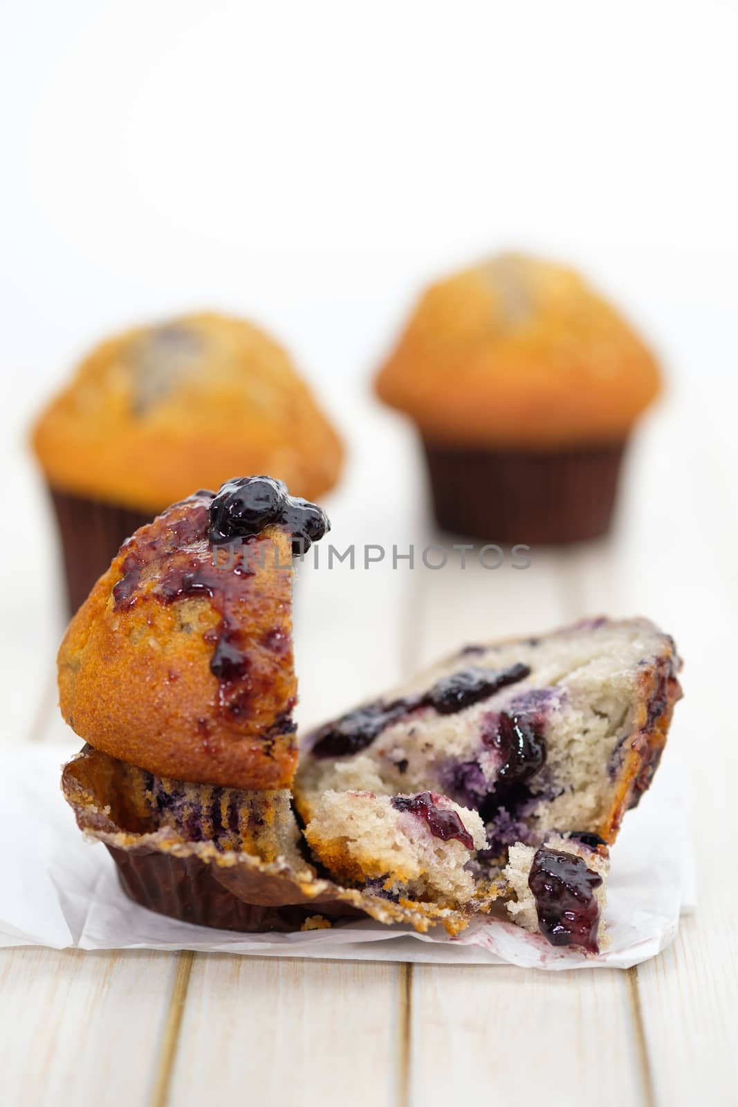 blueberry muffins in a rustic style.  by feelartfeelant