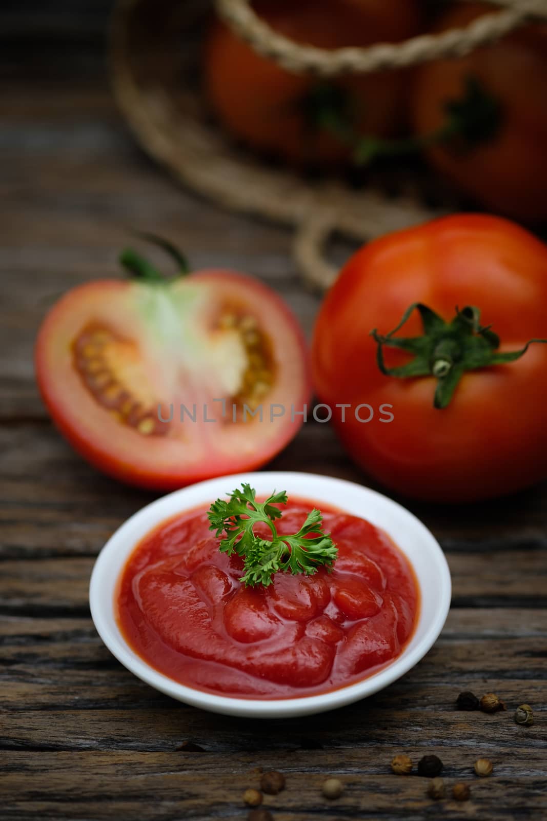 Still life of fresh ripe tomatoes sauce on wooden background, Choose focus point. Good health concept.